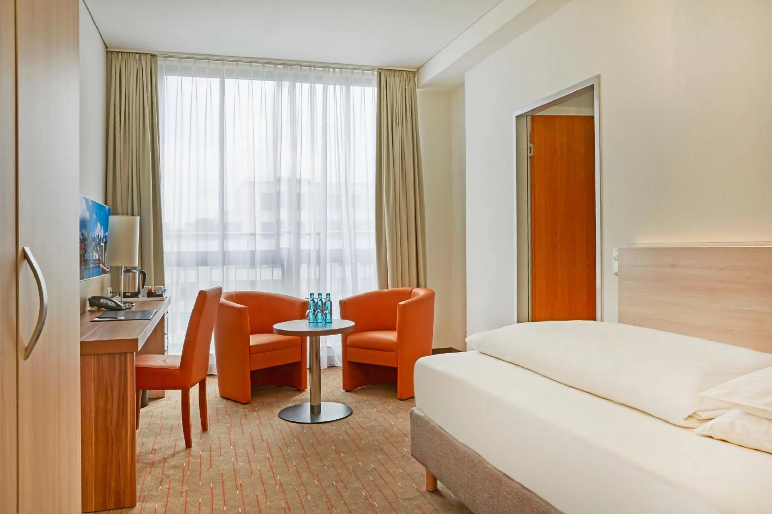 Photo of the whole room, Bed in H+ Hotel Berlin Mitte