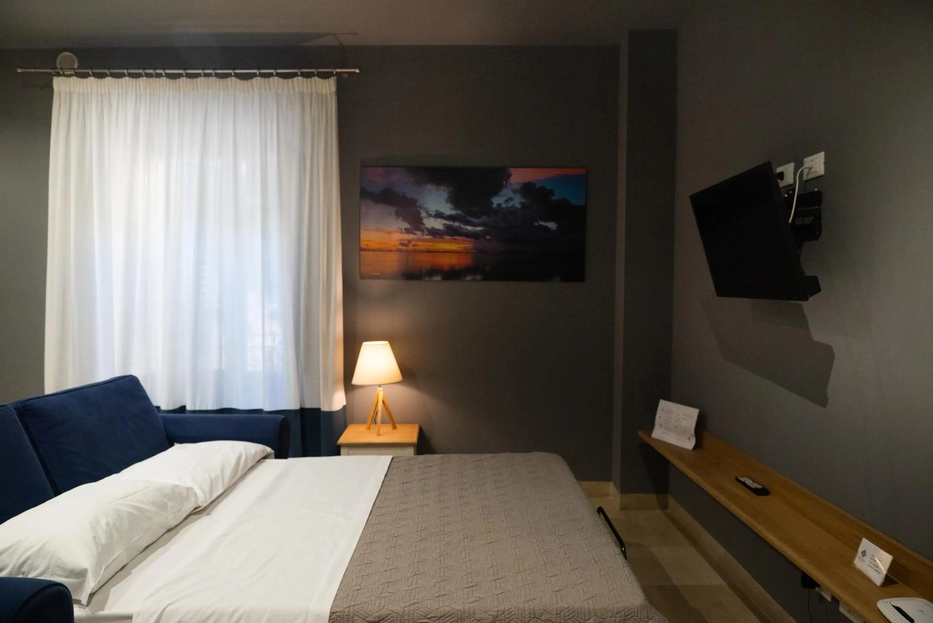 Living room, Bed in ZIBIBBO SUITES & ROOMS - Aparthotel in Centro Storico a Trapani