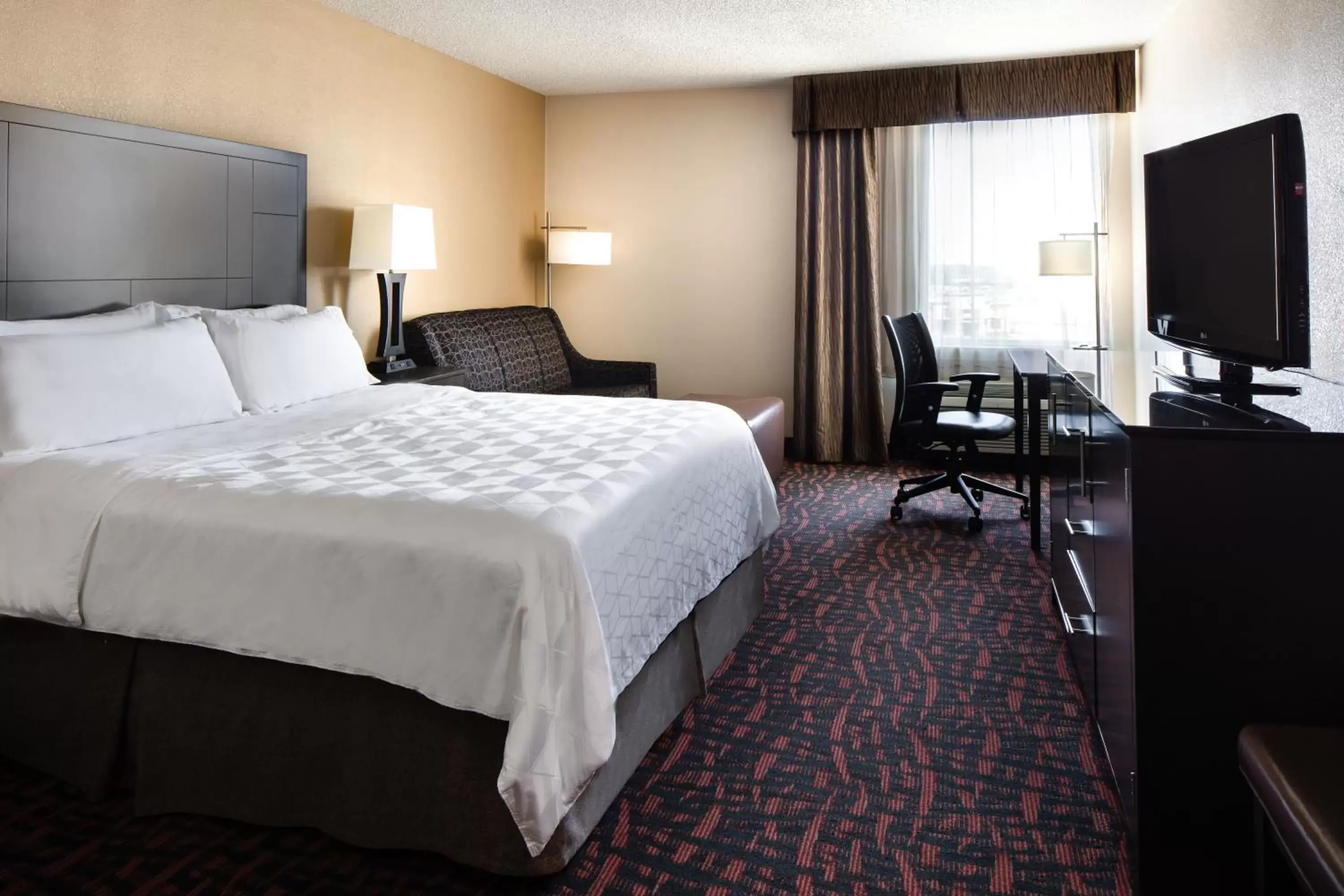 Photo of the whole room, Bed in Holiday Inn Wichita East I-35, an IHG Hotel