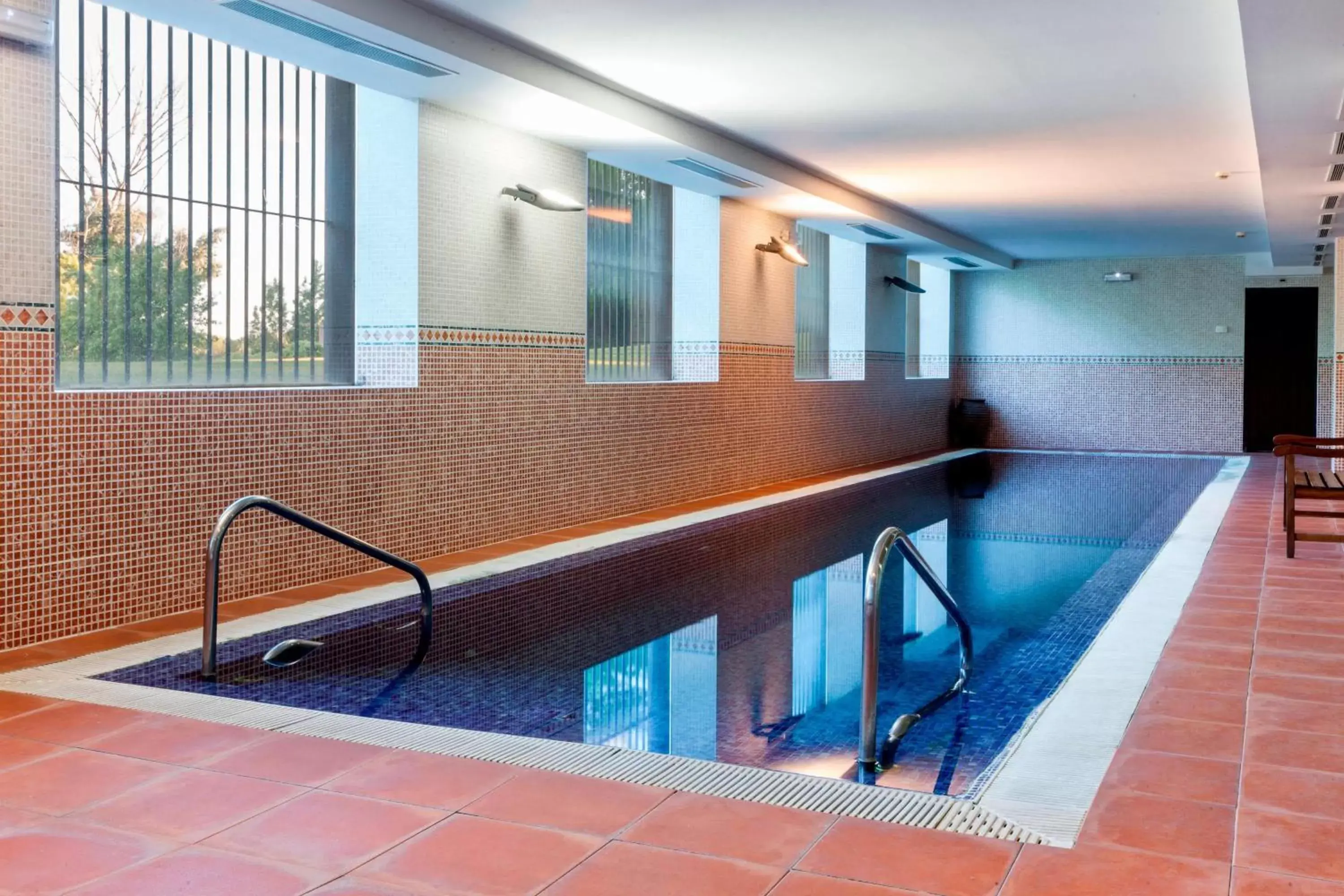 Swimming Pool in AC Hotel Palacio de Santa Ana by Marriott