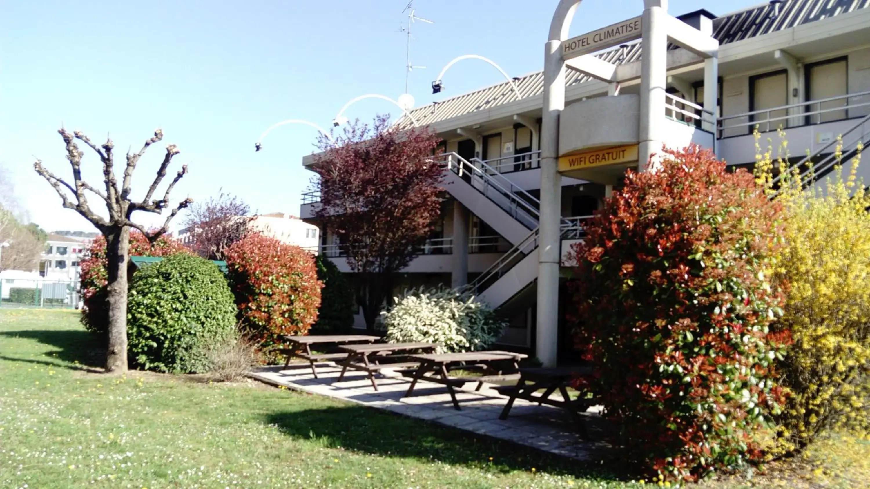 Garden view, Property Building in Premiere Classe Périgueux - Boulazac