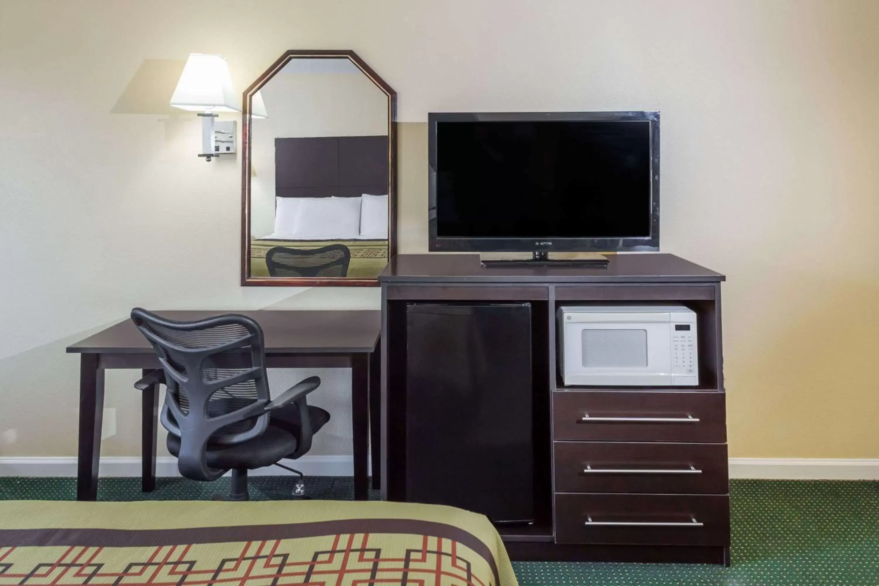 Photo of the whole room, TV/Entertainment Center in Days Inn by Wyndham Enterprise