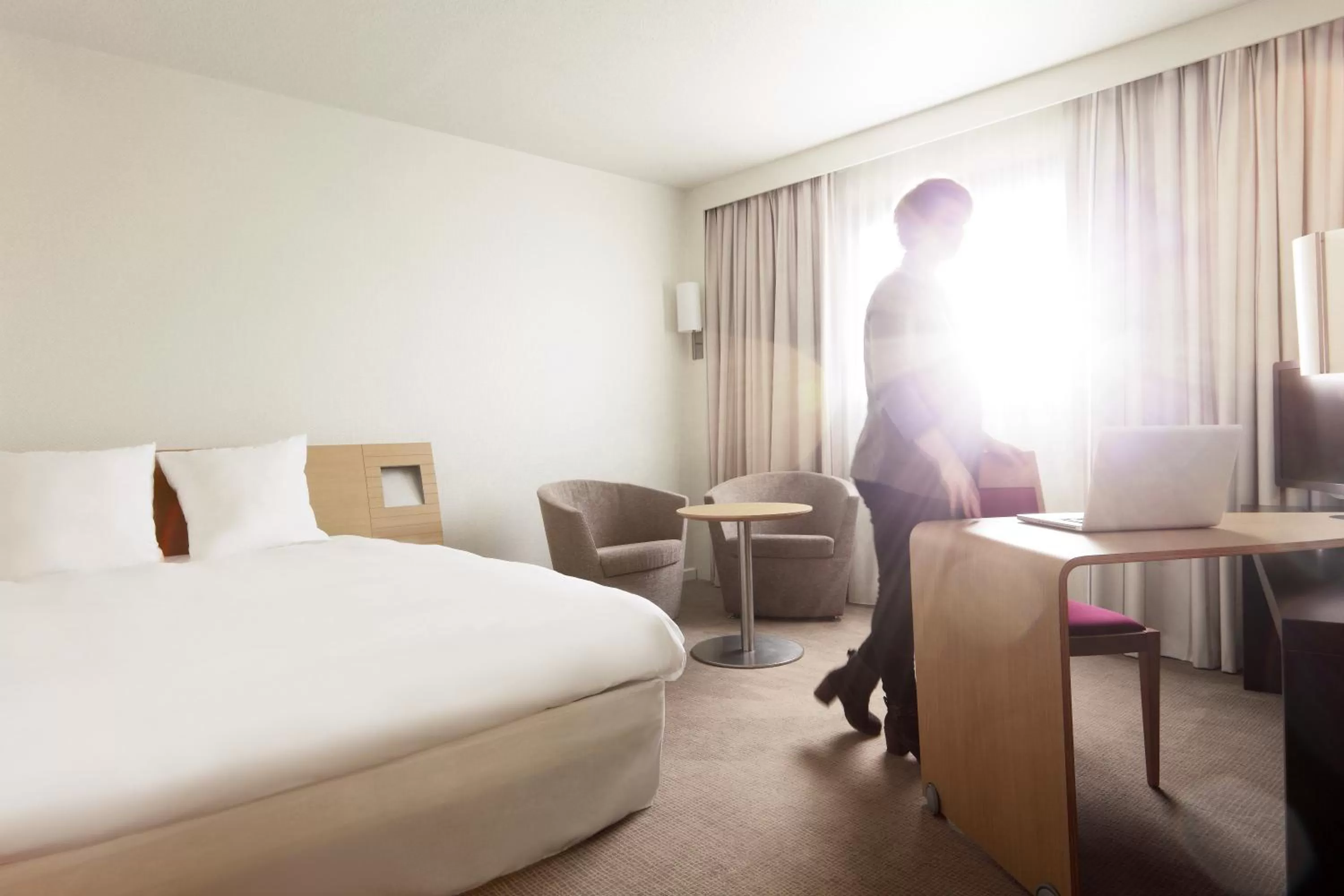 Seating area, Bed in Novotel Belfort Centre Atria