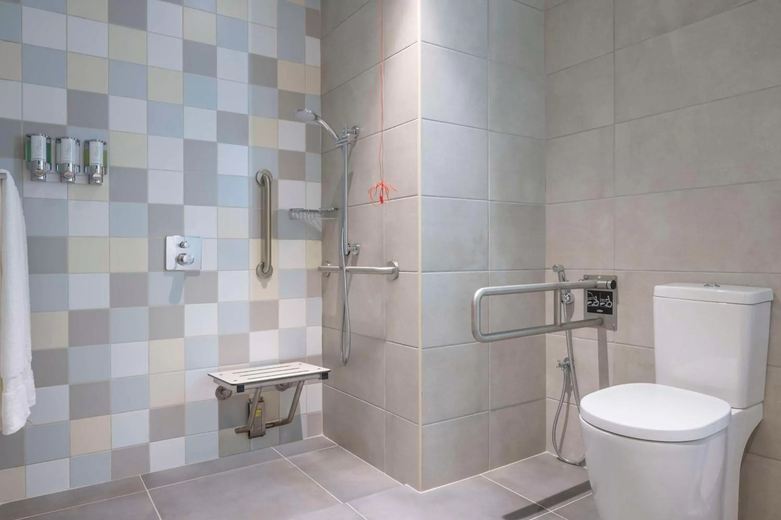 Bathroom in Hampton By Hilton Doha Old Town Bathroom in Hampton By Hilton Doha Old Town