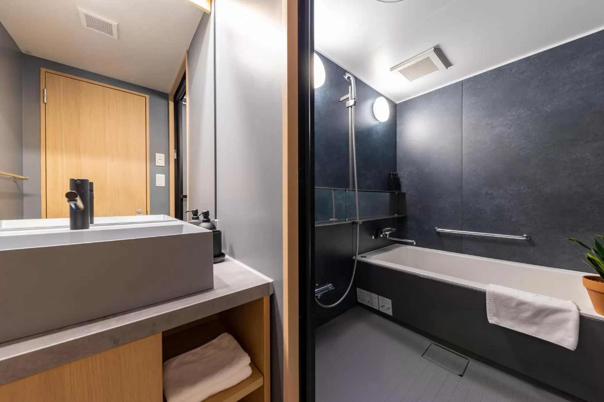 Bathroom in THE HAPPO by Hakuba Hotel Group