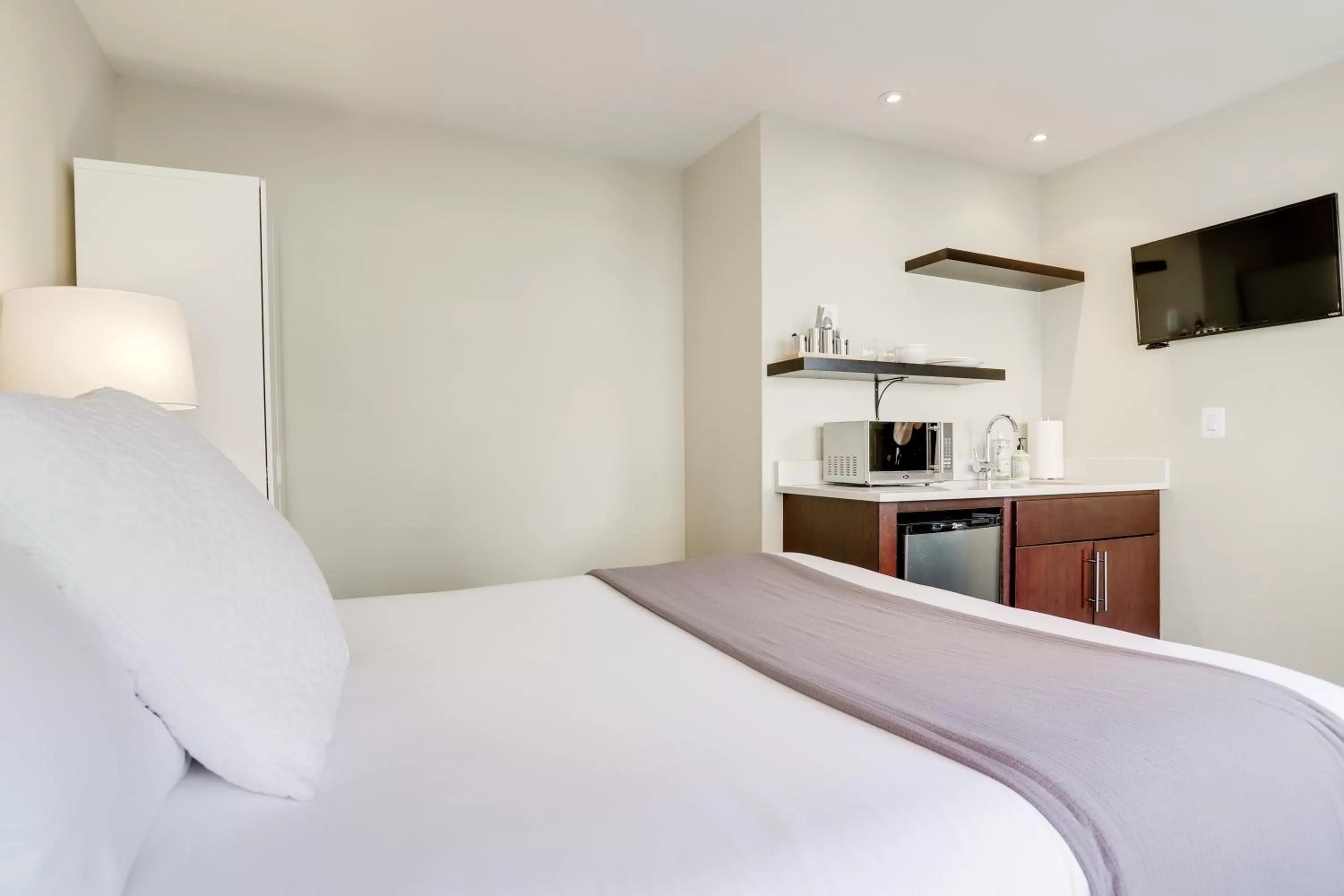 Bed in Sojourn at DuPont Place