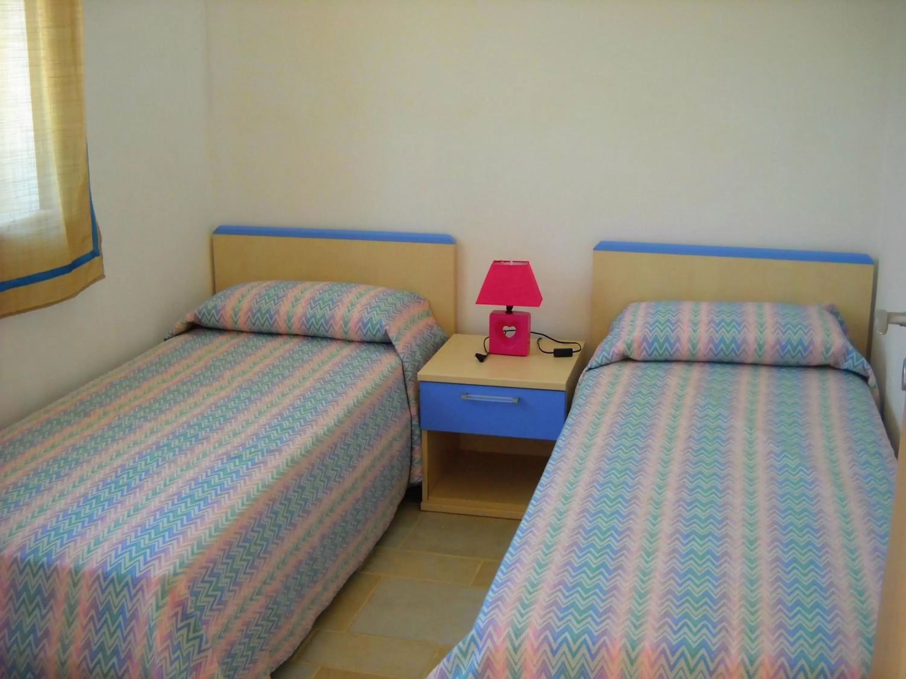 Bed in Zagare Residence