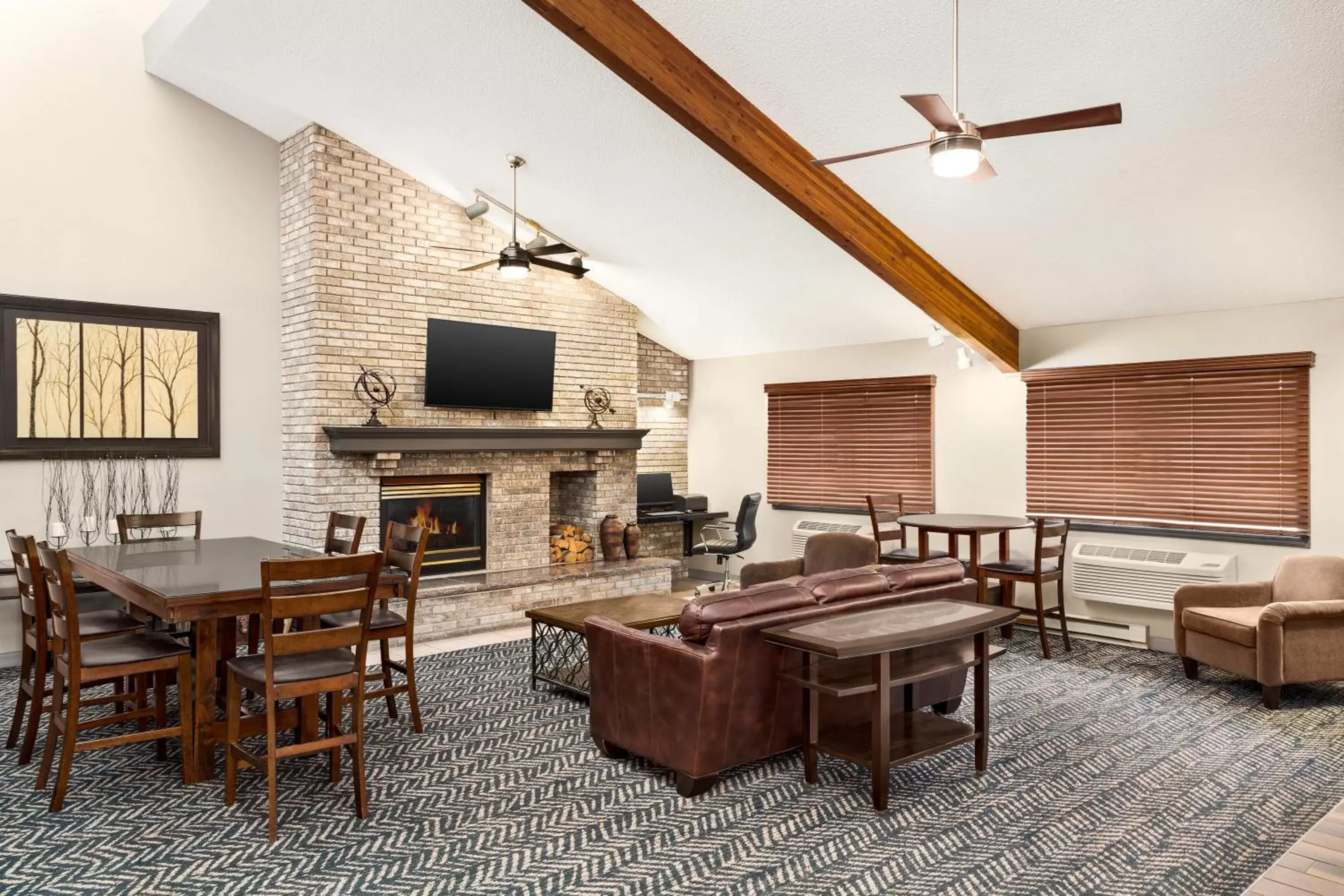 Lobby or reception, Seating Area in AmericInn by Wyndham Sauk Centre