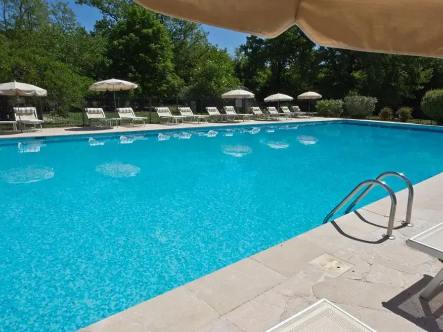 Swimming Pool in Hotel-Restaurant Le Moulin De La Camandoule