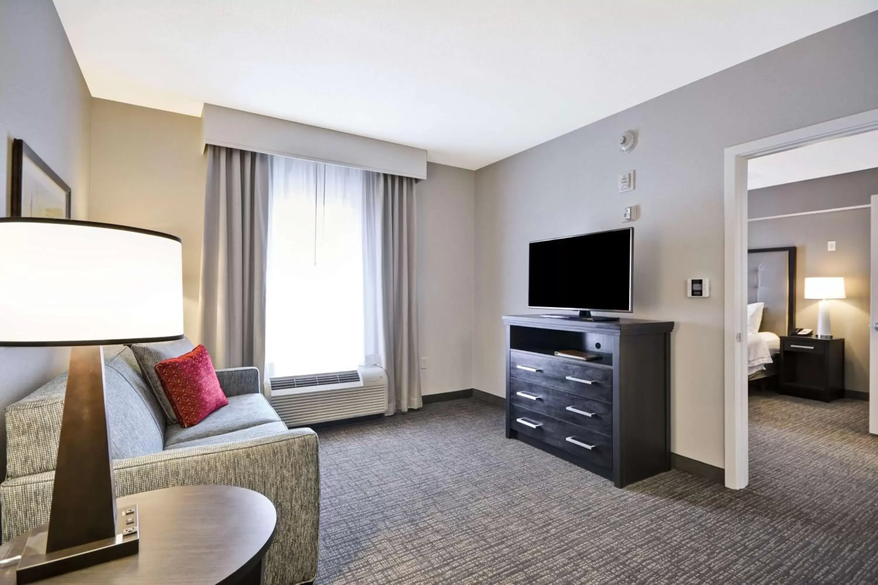 Bedroom, Seating Area in The Homewood Suites by Hilton Ithaca