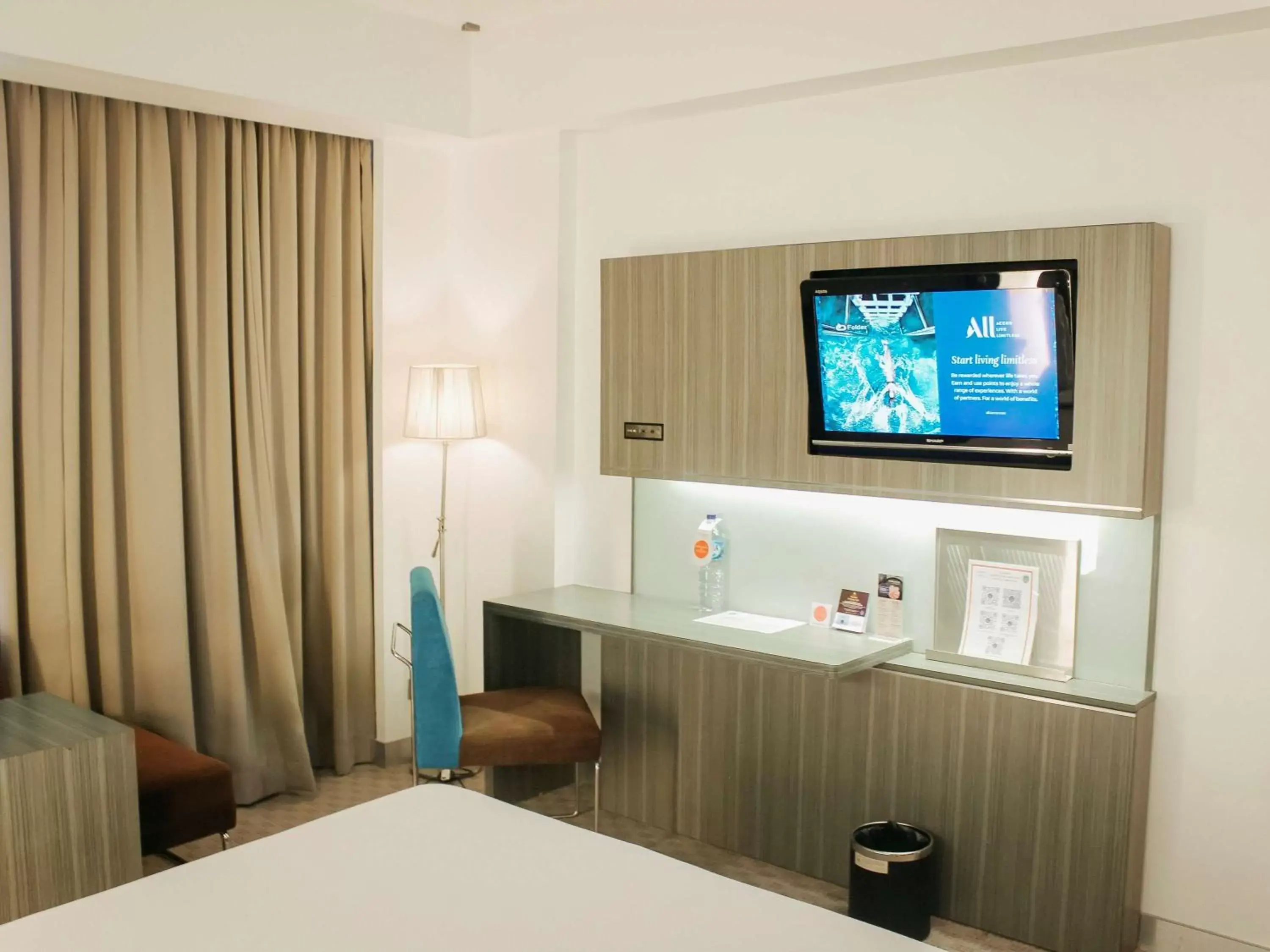 Photo of the whole room, TV/Entertainment Center in Novotel Bangka Hotel & Convention Center