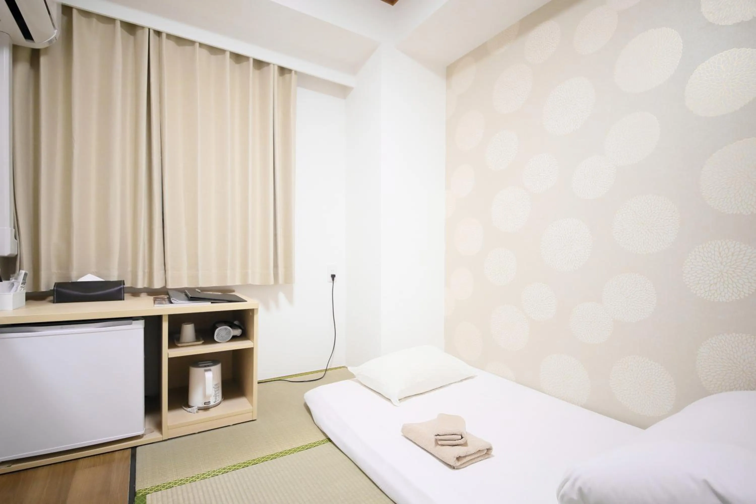 Bed in Hotel Shin-Imamiya