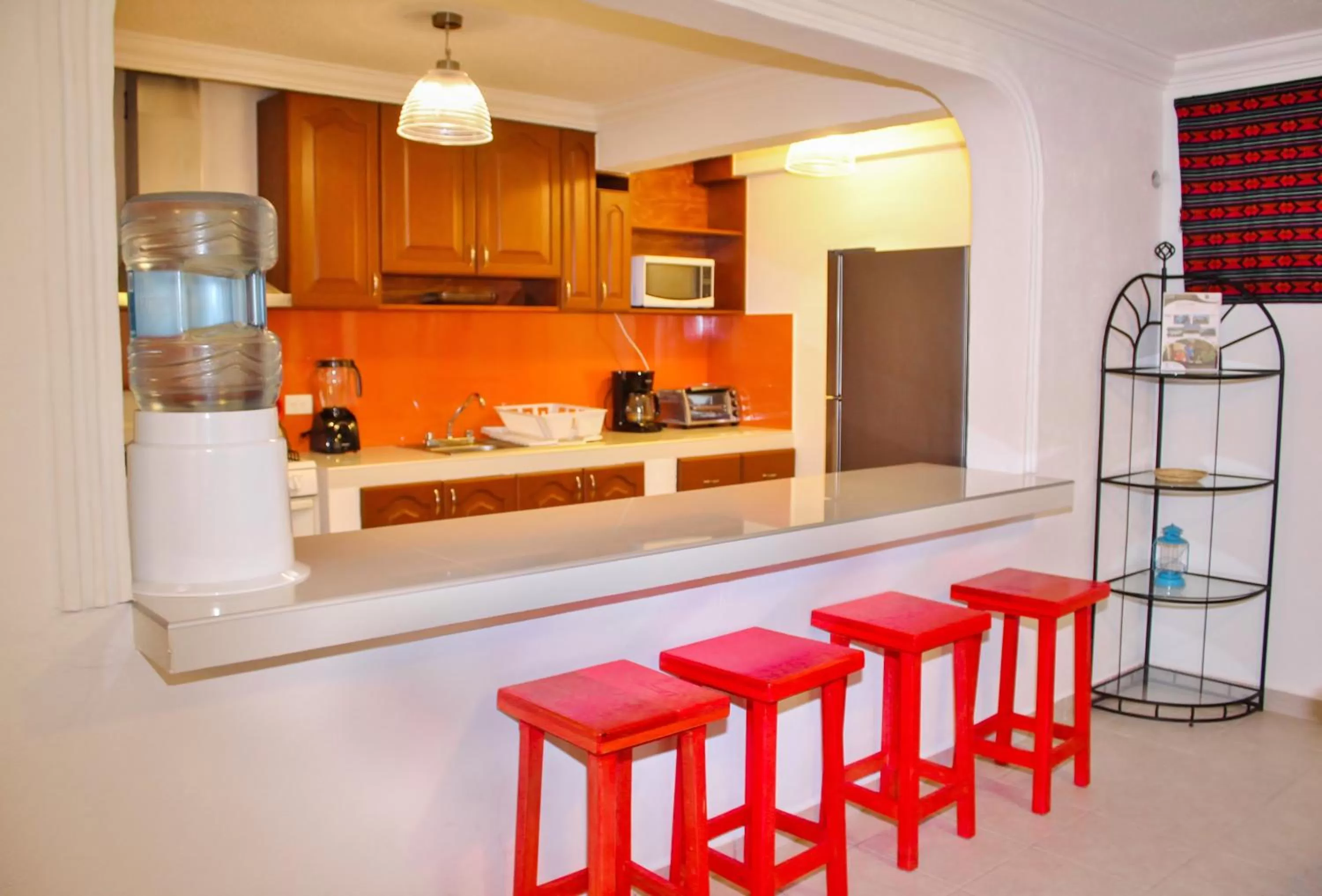 Kitchen or kitchenette in Hotel Villas Colibrí Suites & Bungalows