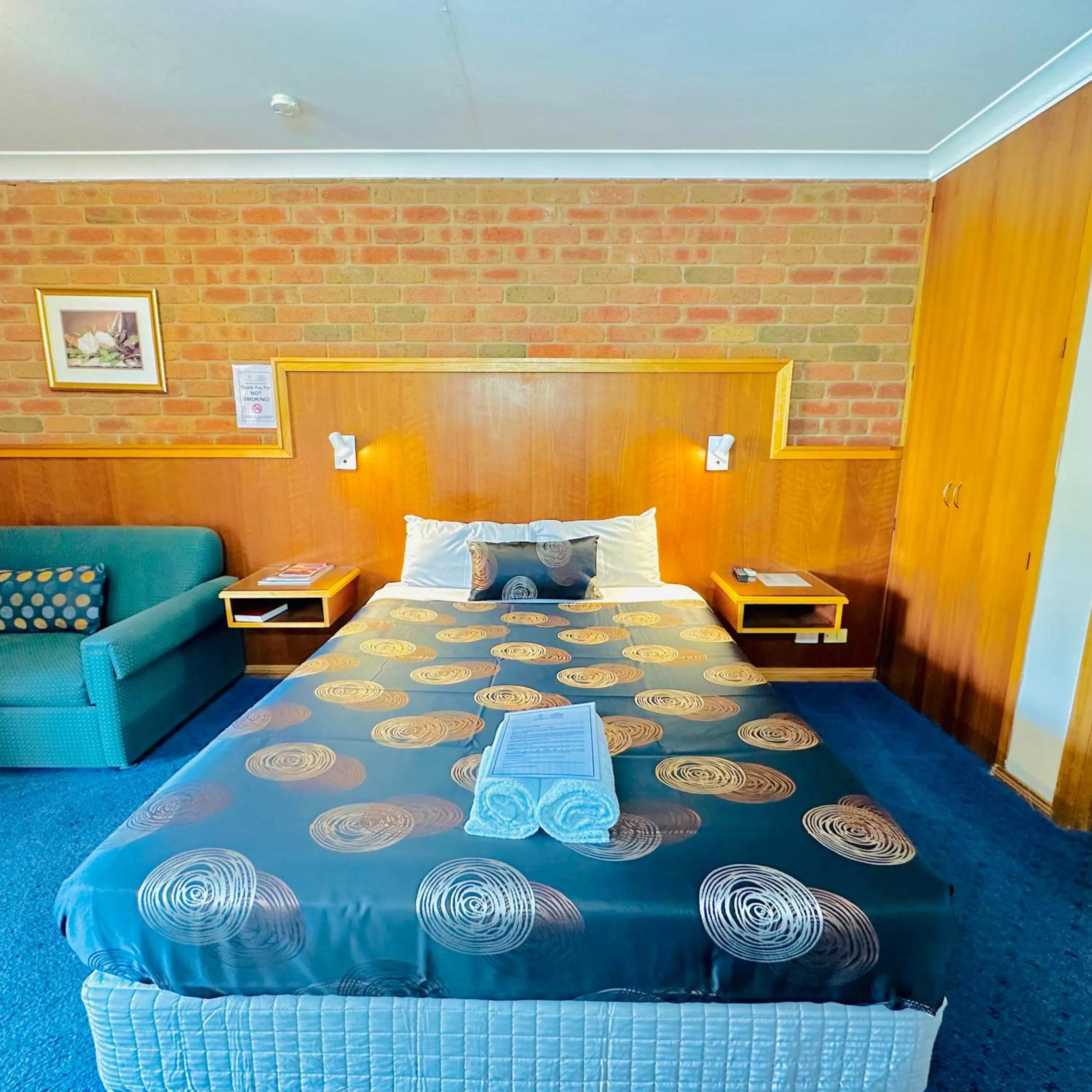 Bed in Early Australian Motor Inn