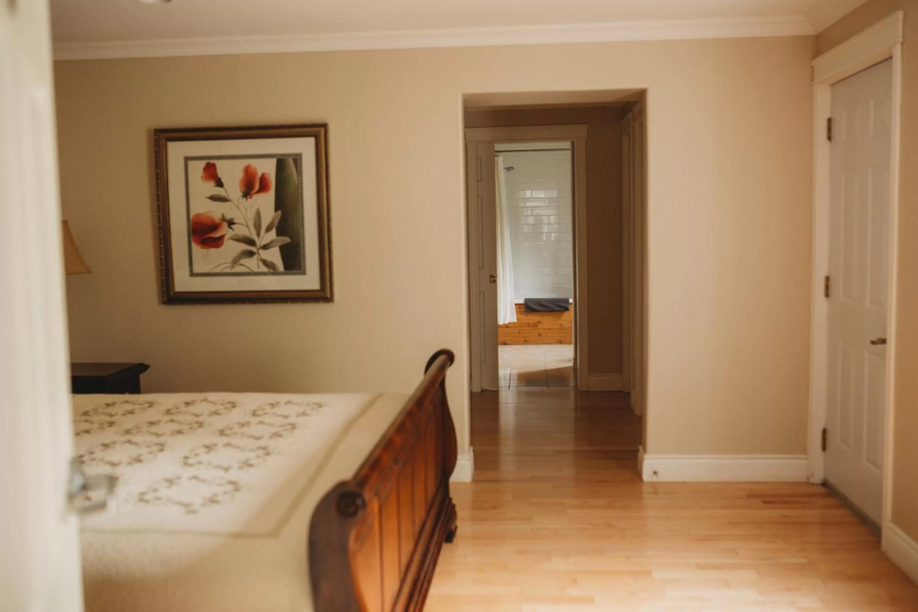 Bedroom, Bed in Carriage House Inn Four and a Half Stars