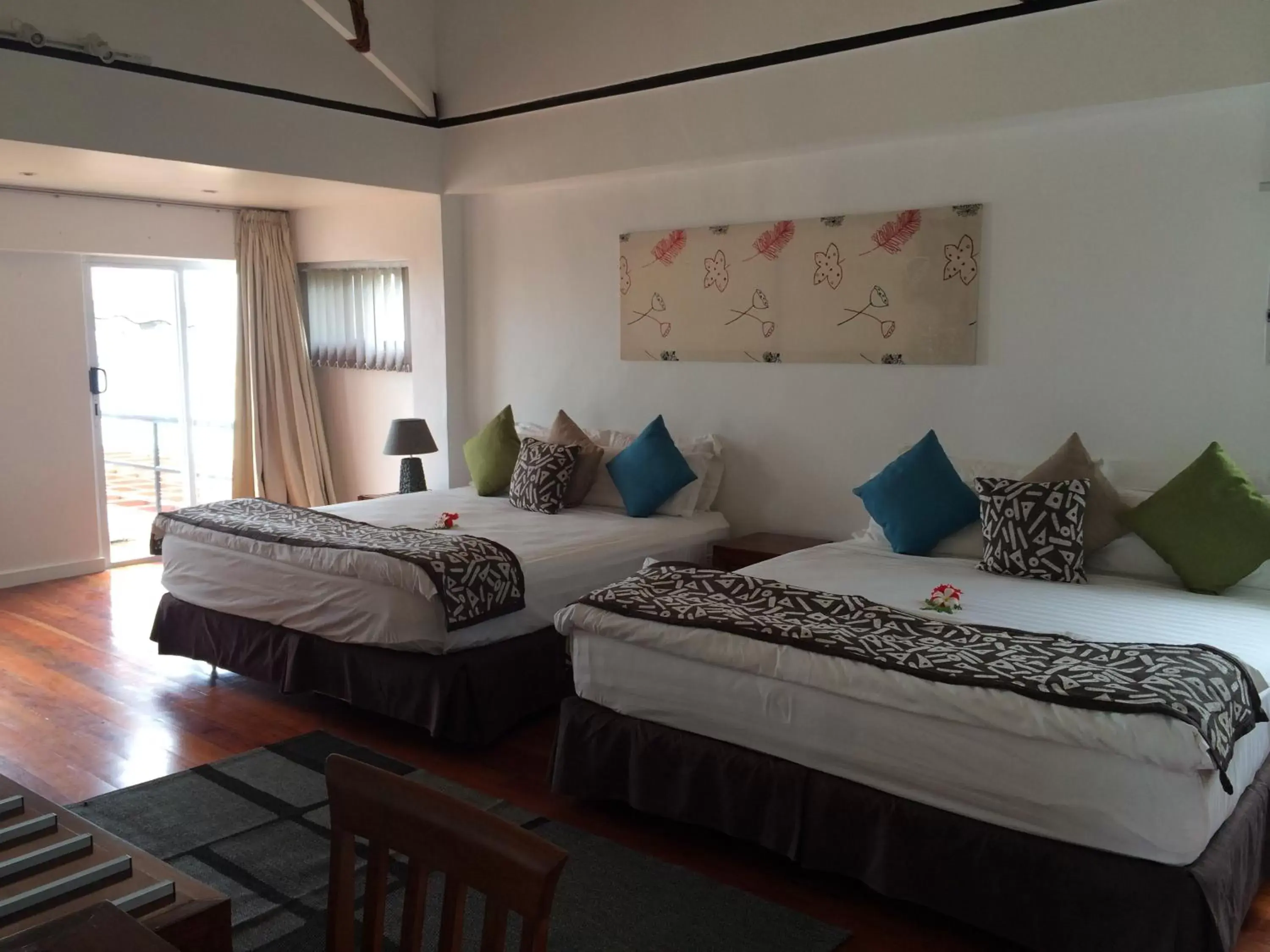 Photo of the whole room, Room Photo in First Landing Beach Resort & Villas