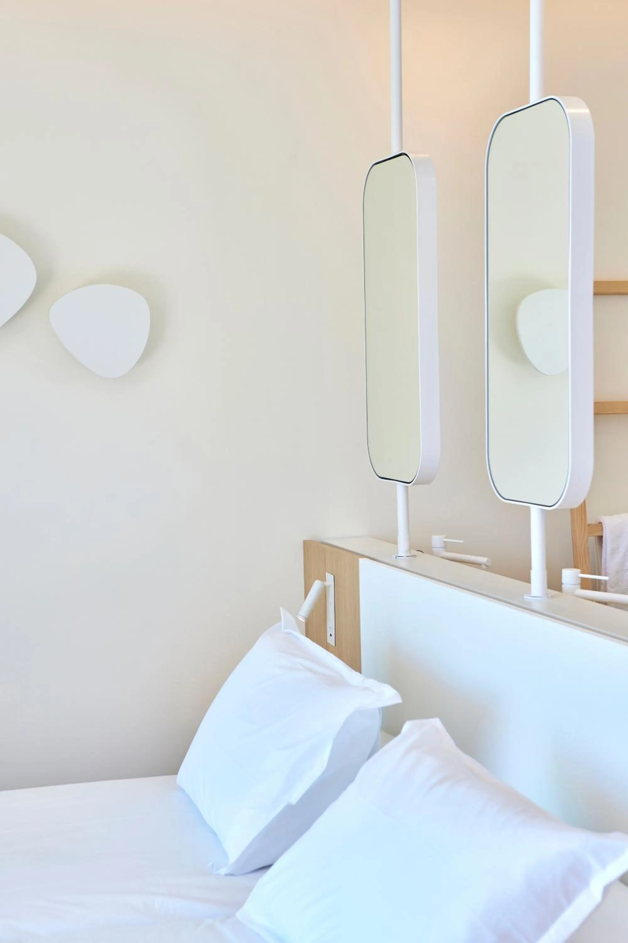 Bed in Universal Hotel Aquamarin