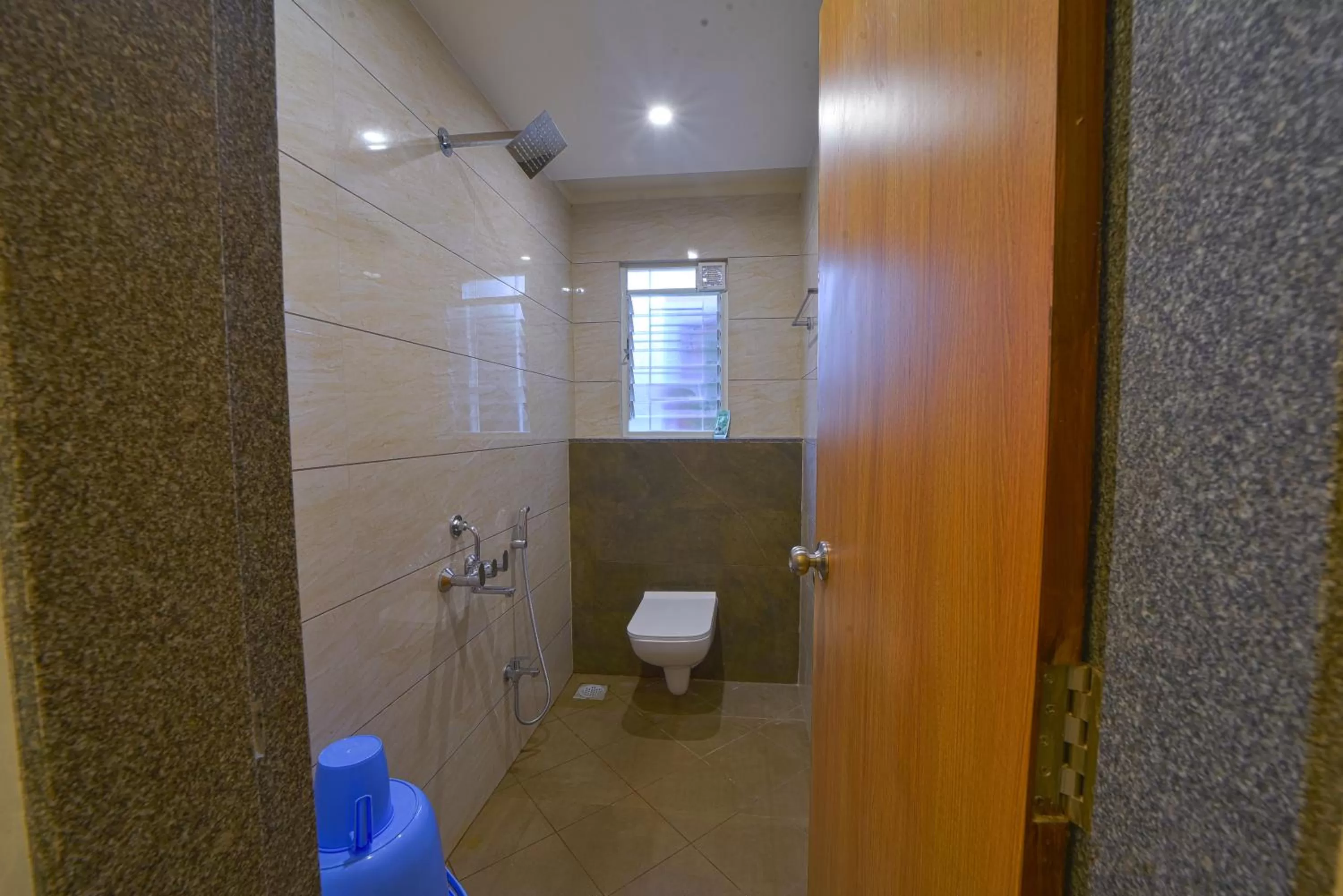 Shower in Hotel TrushaDham Near to Mahalaxmi Temple Kolhapur