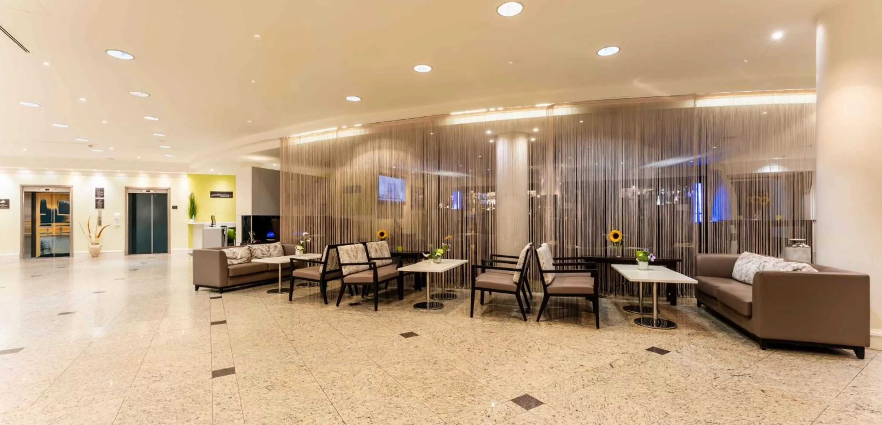 Lobby or reception in PLAZA Premium Wien