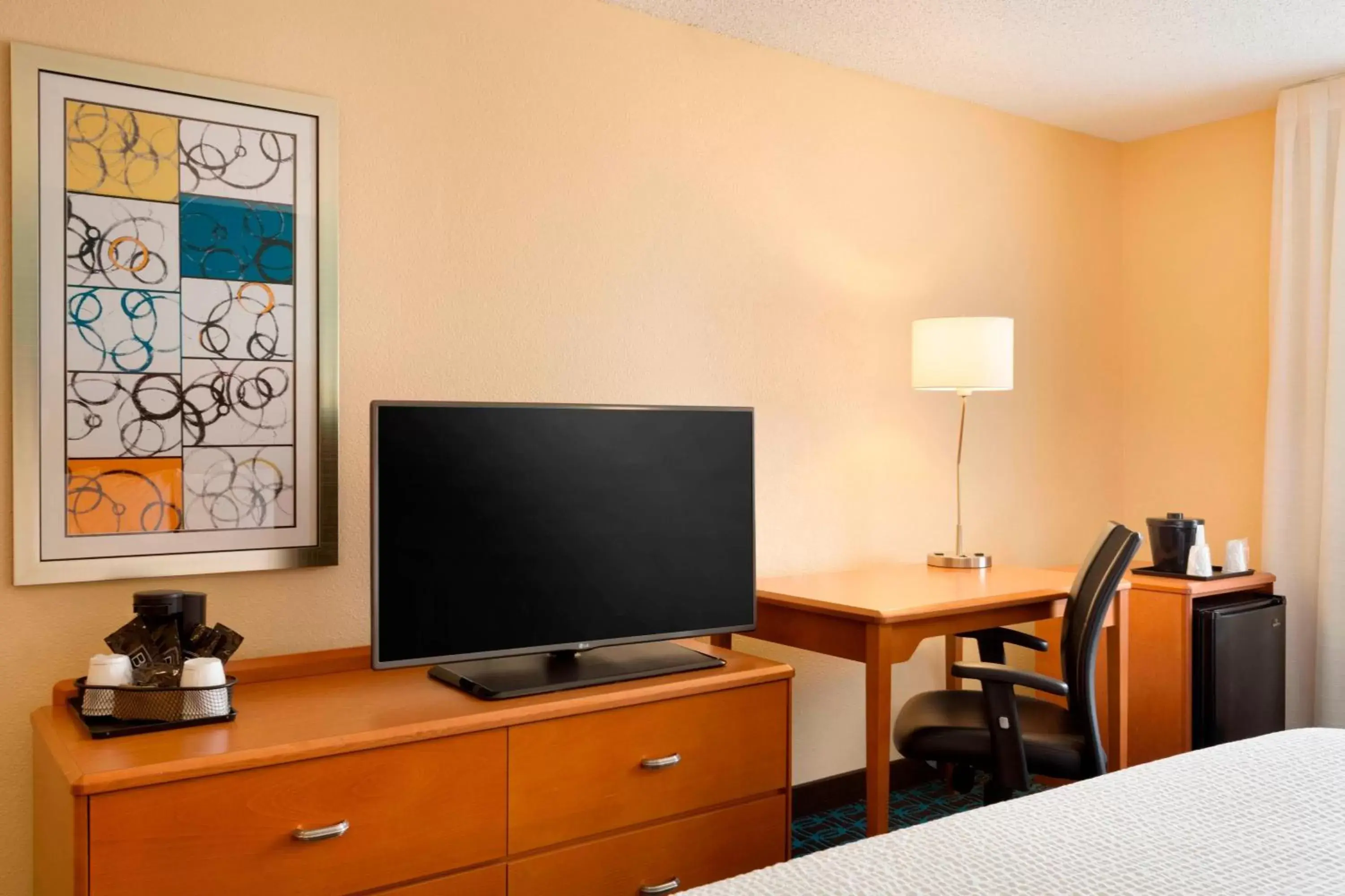 Photo of the whole room, TV/Entertainment Center in Fairfield Inn & Suites by Marriott Dallas Plano