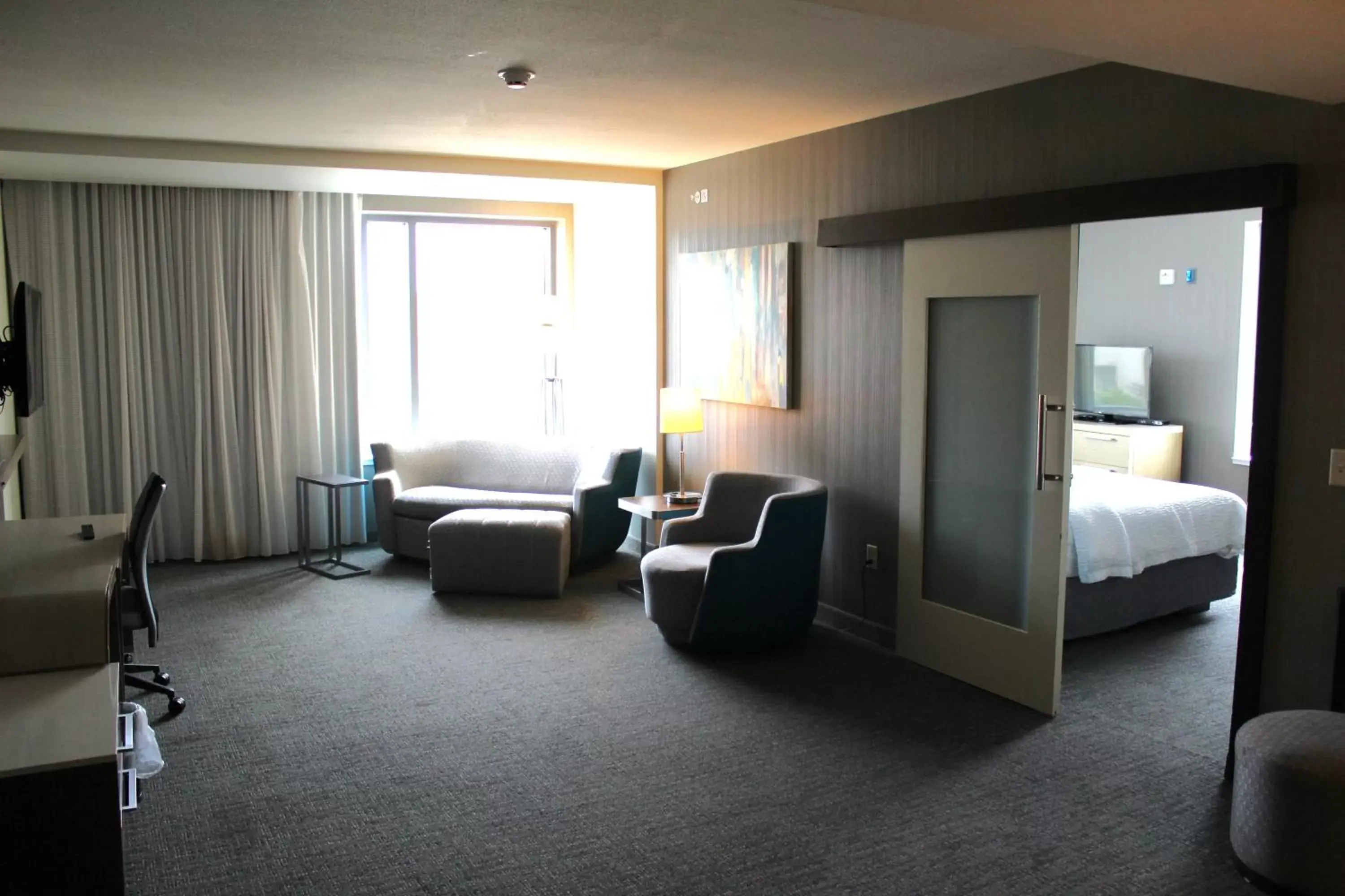 Living room, Seating Area in Courtyard by Marriott Muncie at Horizon Convention Center