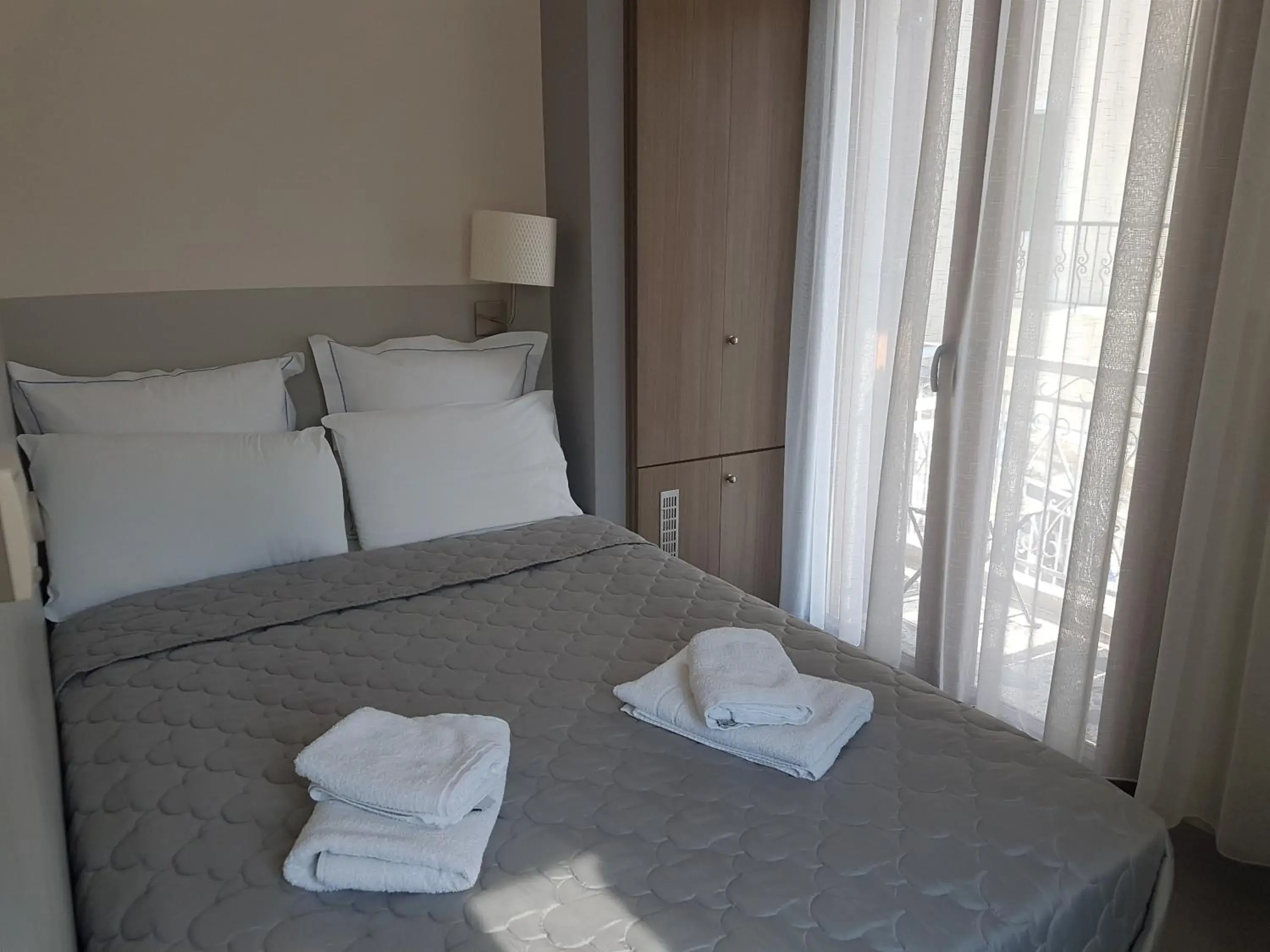 Bed in Dimitra Boutique Hotel