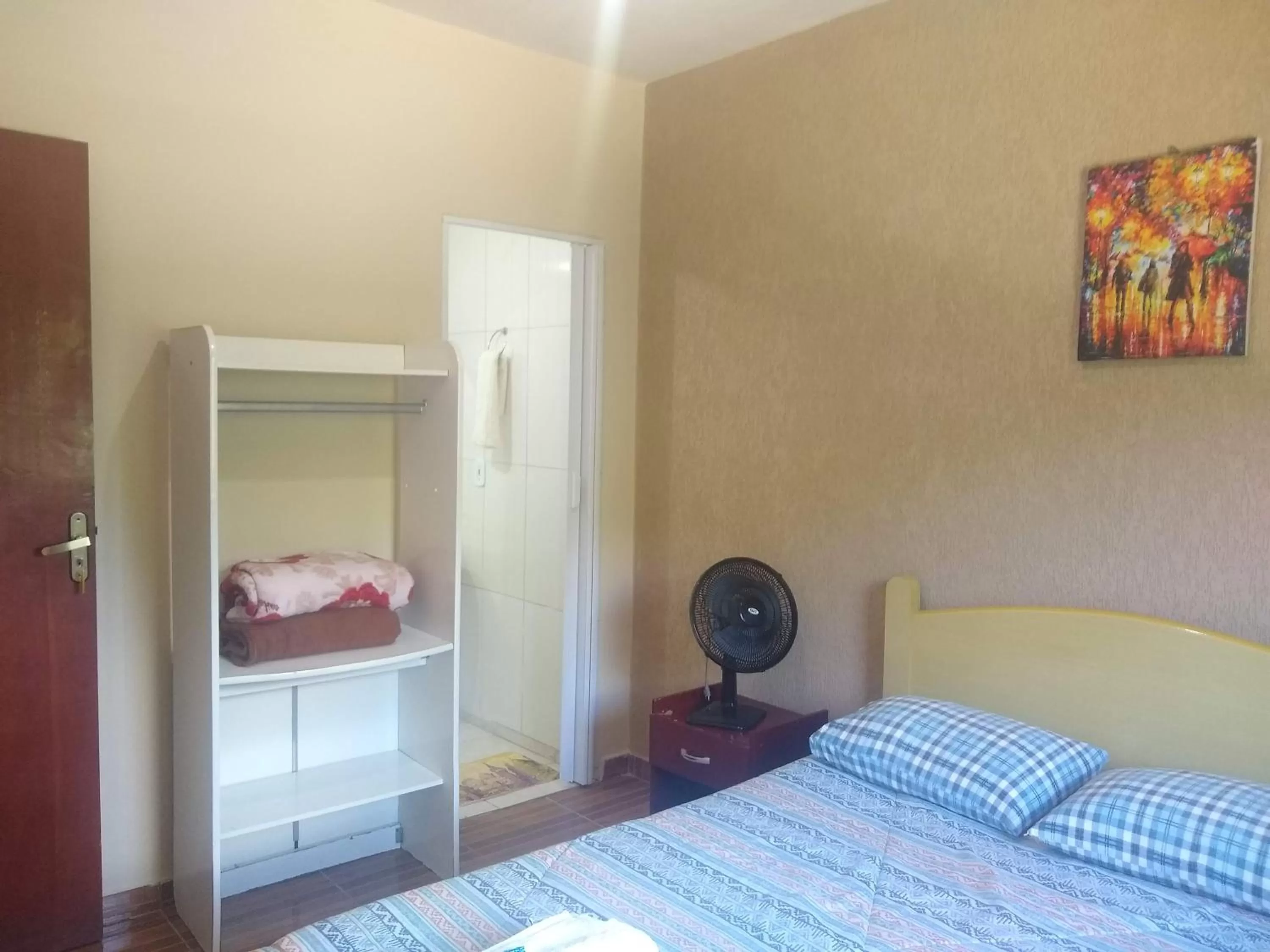 Bed in Pousada do Ribeirão