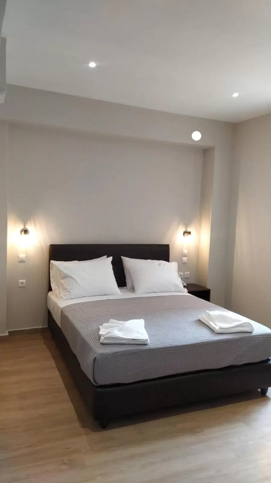 Bed in New Amaryllis Hotel