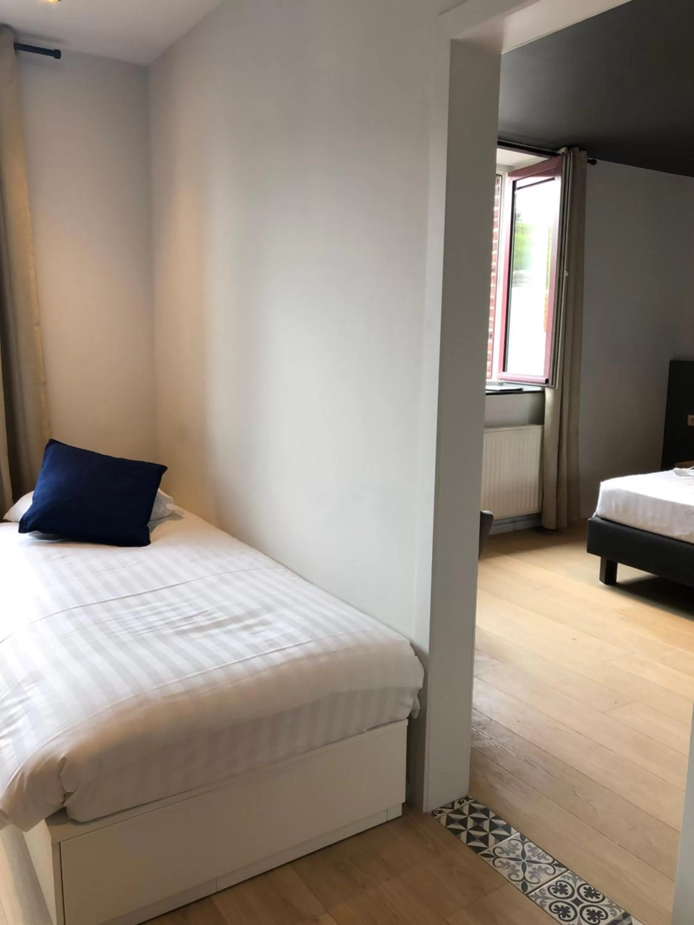 Bed in Hotel Le Cygne d'Argent