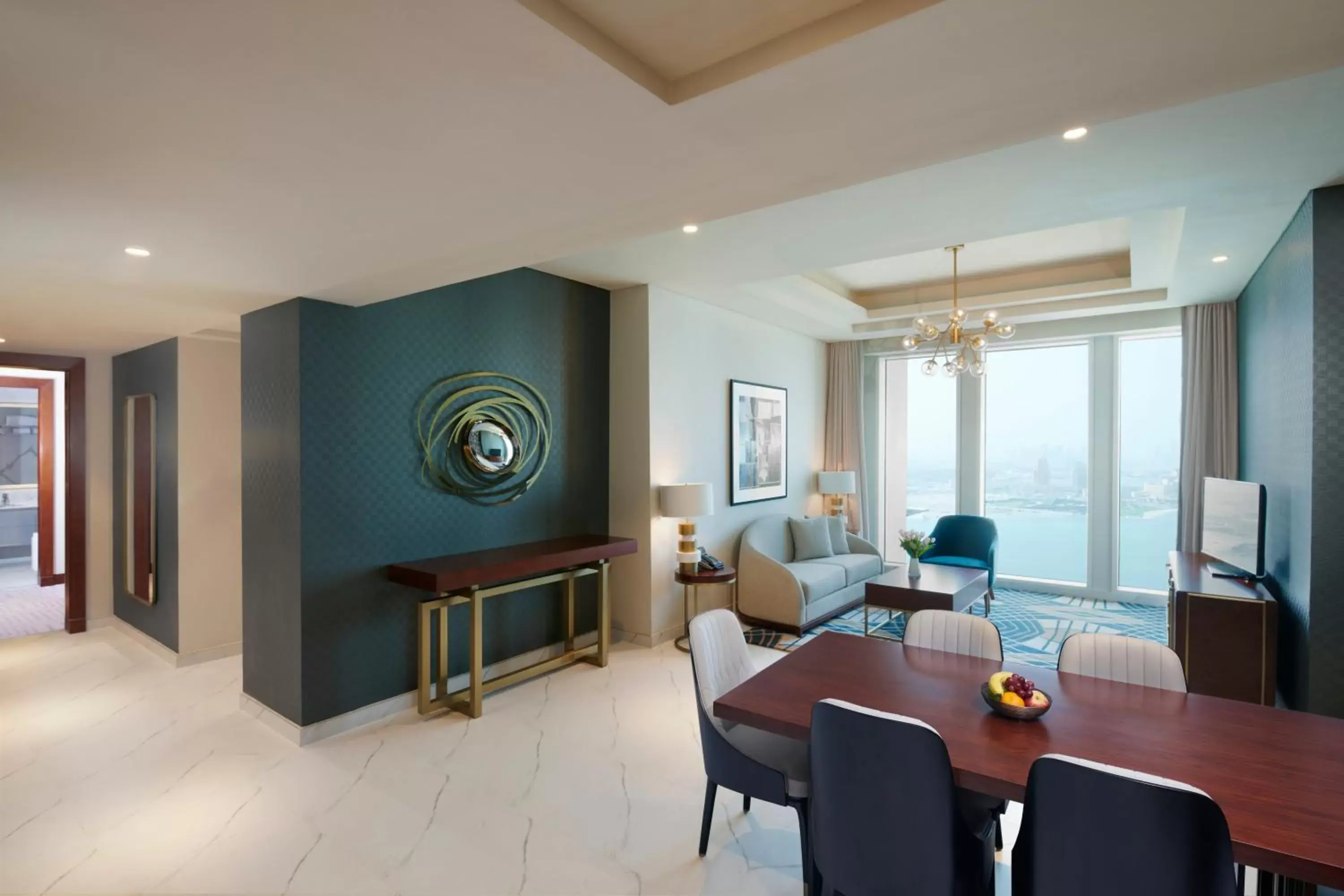 Living room, Dining Area in Wyndham Grand Doha West Bay Beach