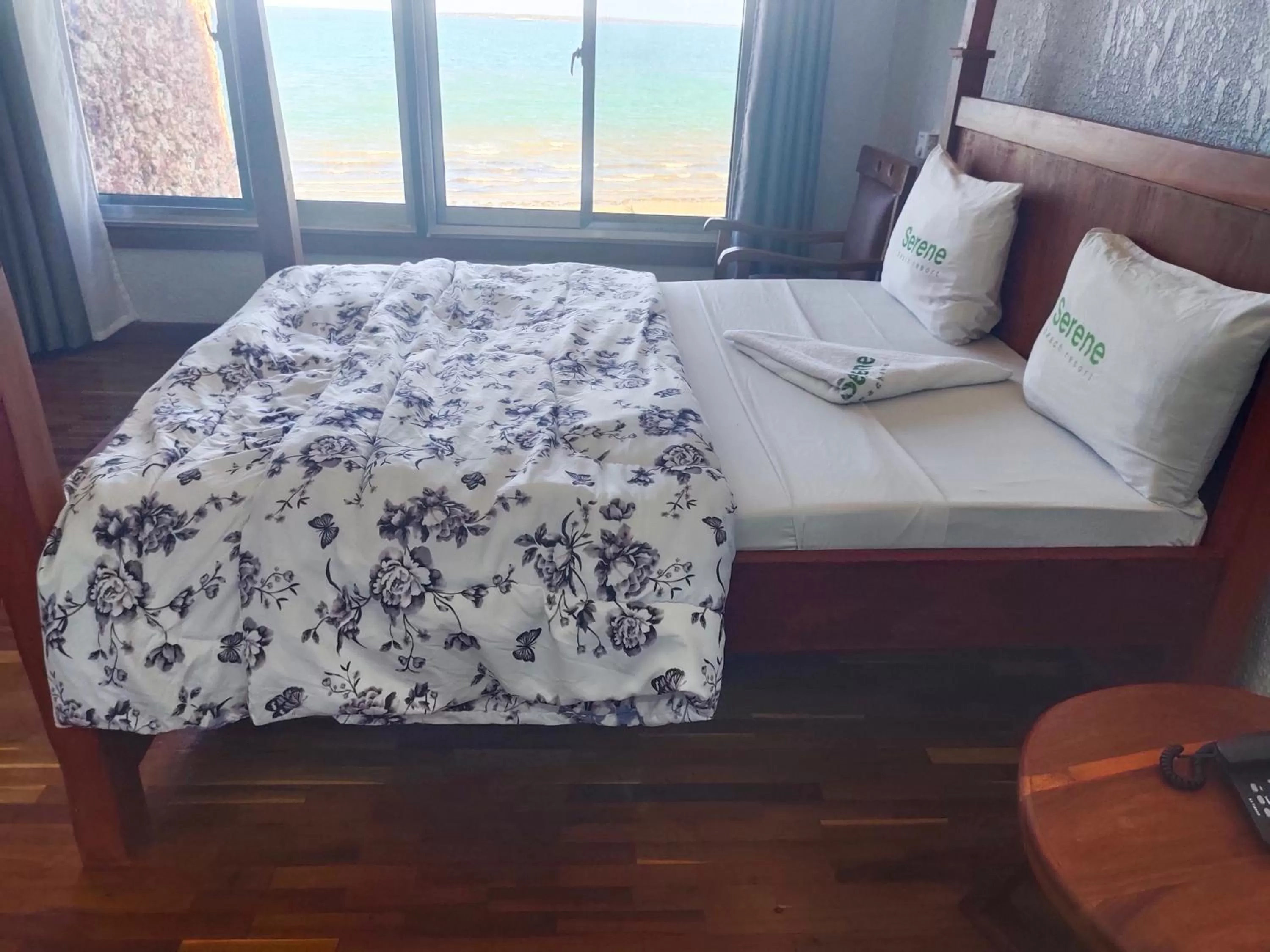 Bed in Serene Beach Resort