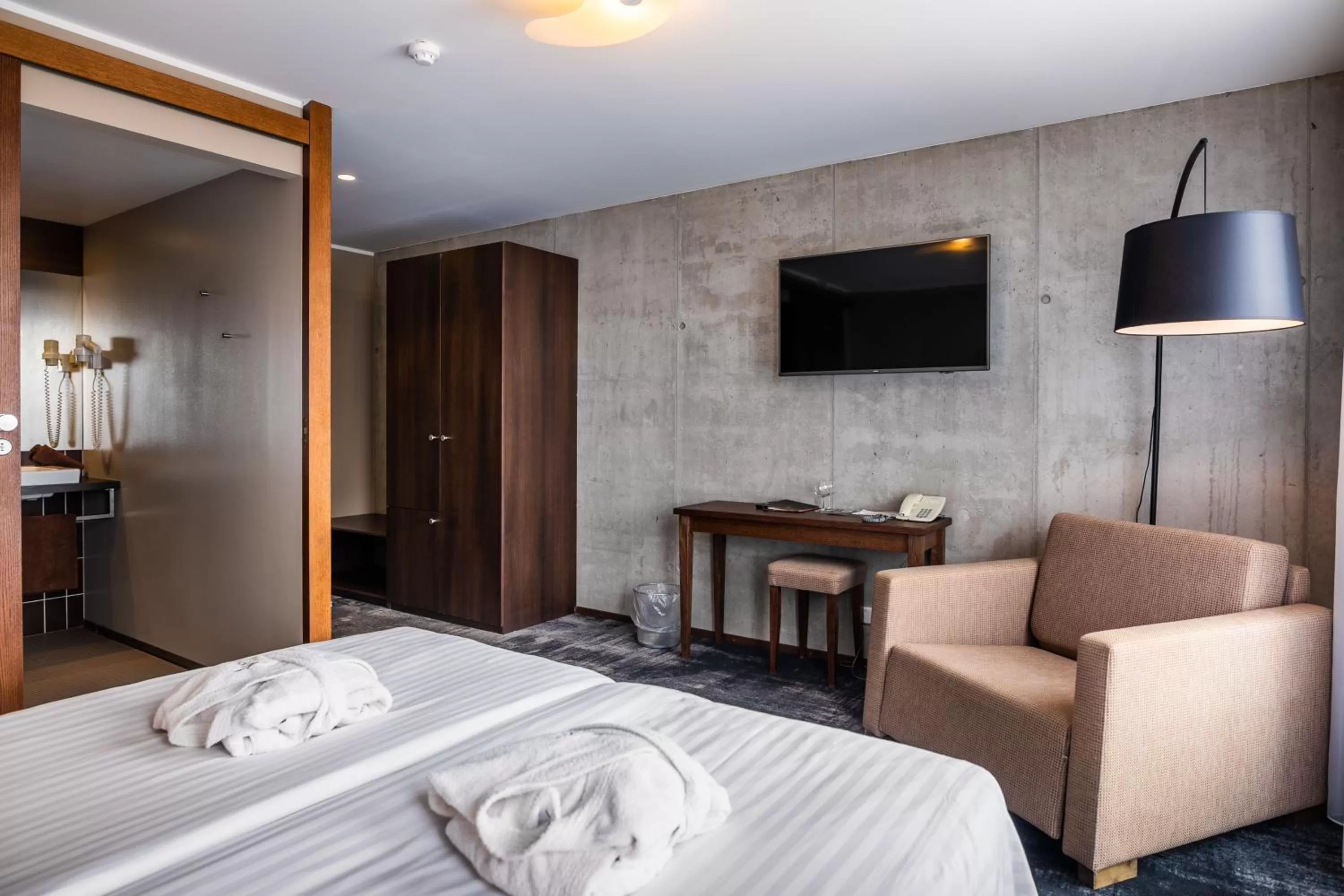 Bed in Johan Design & SPA Hotel