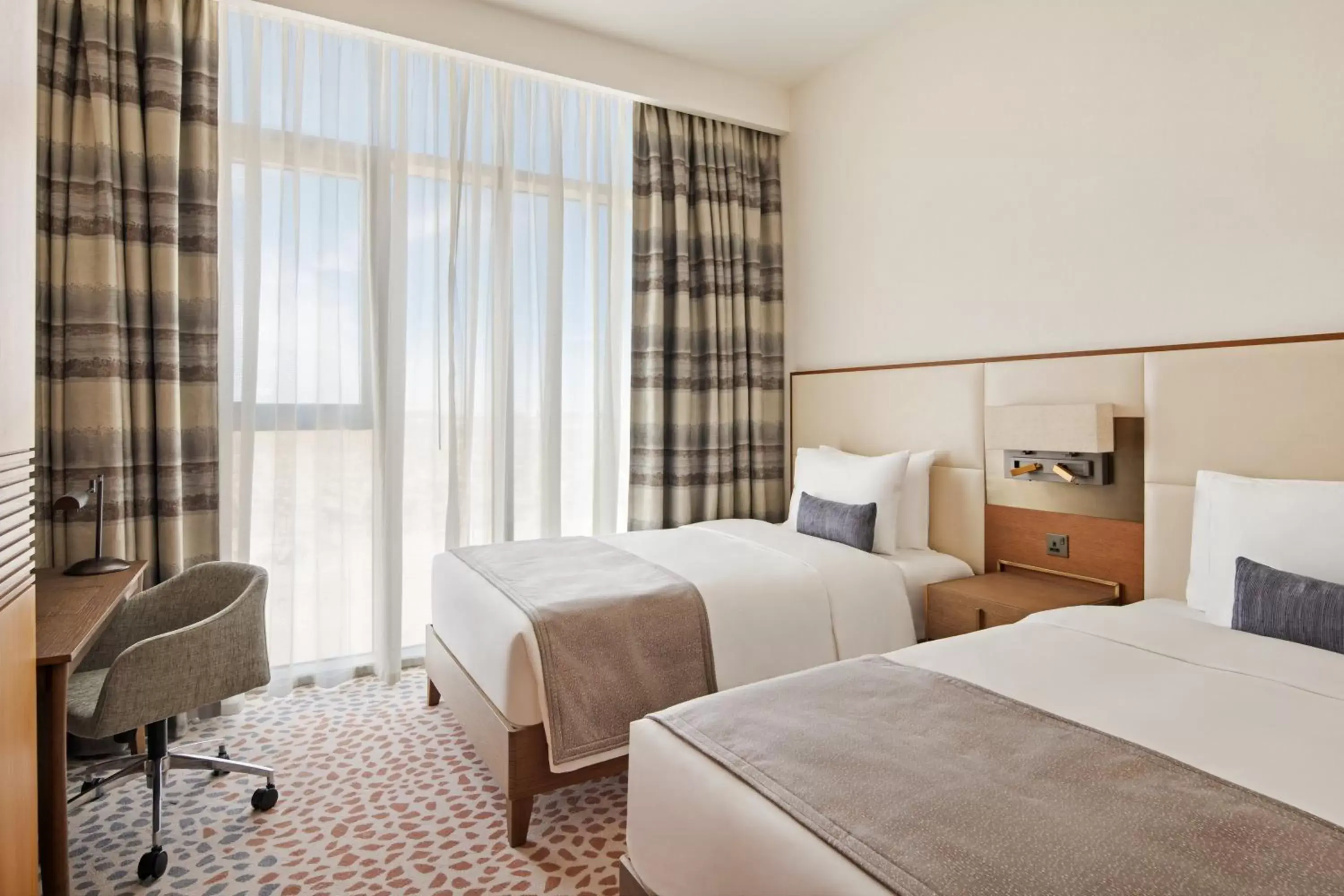 Photo of the whole room, Bed in Staybridge Suites Dubai Al-Maktoum Airport, an IHG Hotel