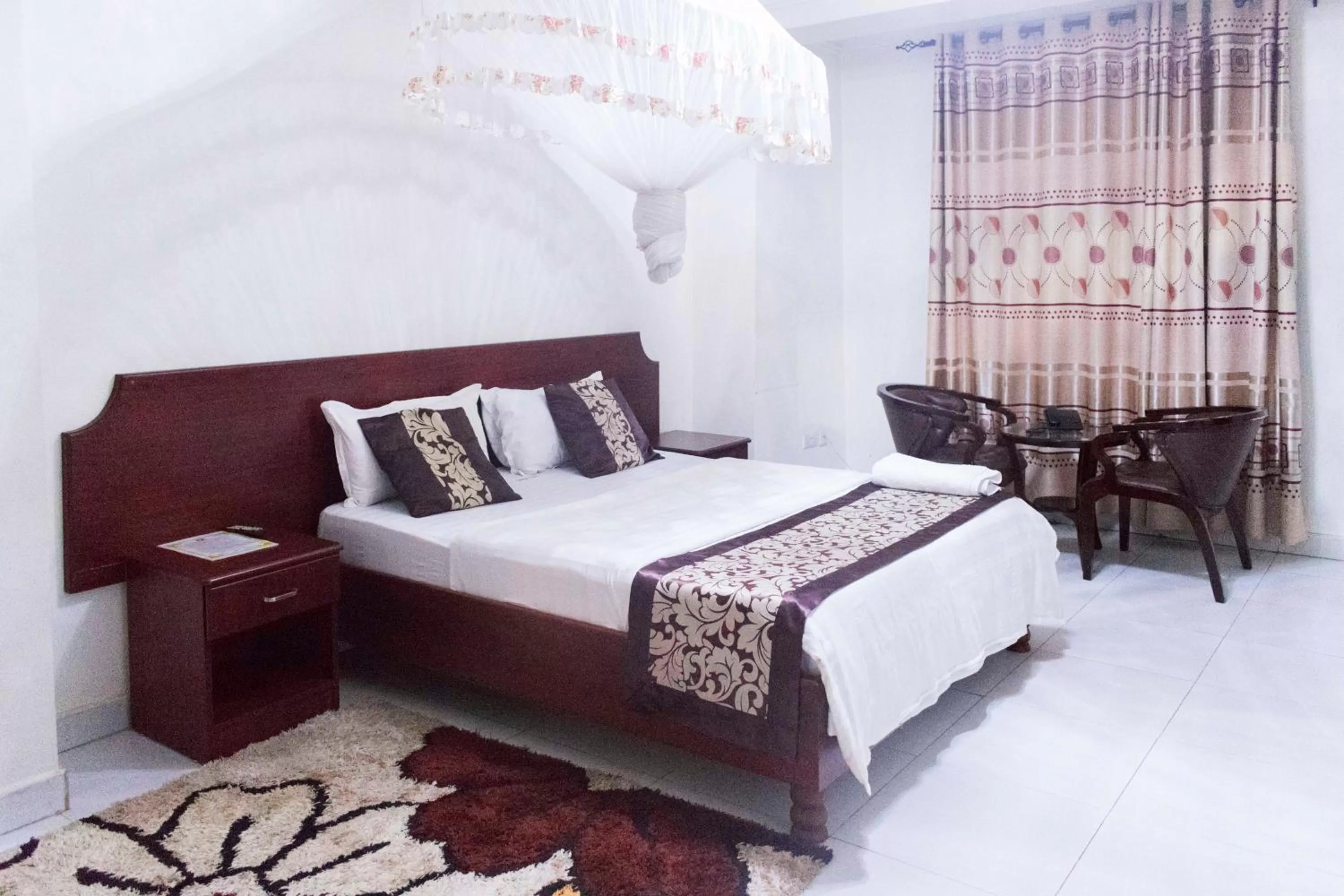 Bed in Sunrise Hotel Kampala