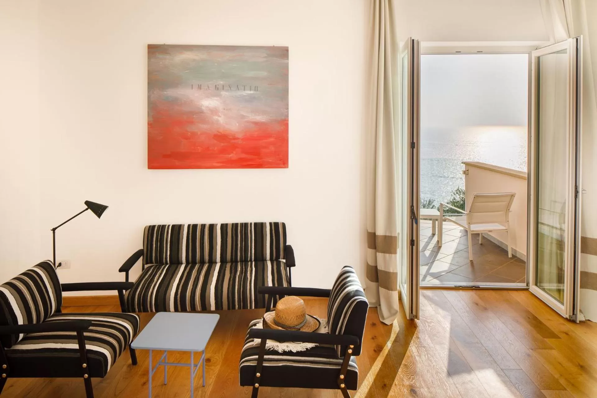 Seating area, Bed in Villa Fiorella Art Hotel