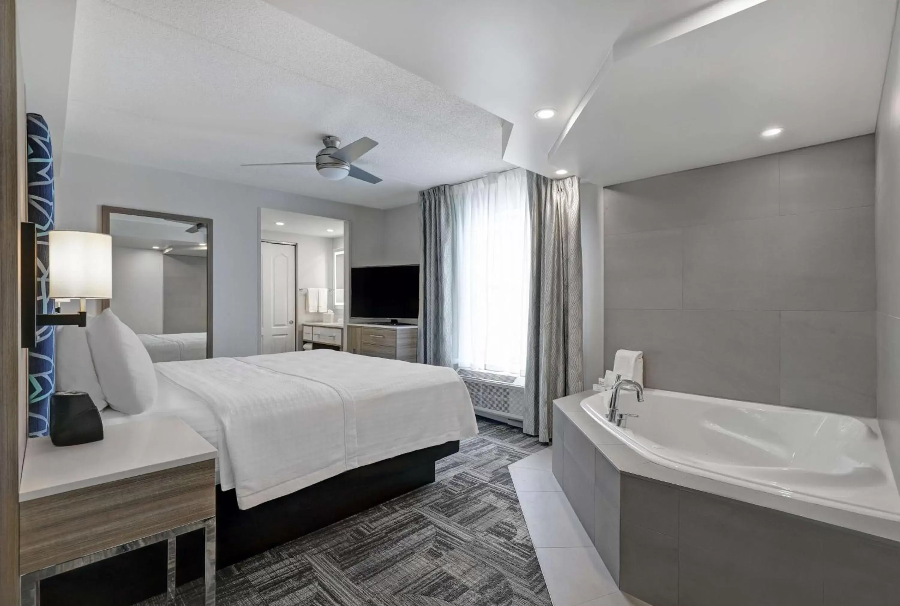 Bed, Bathroom in Homewood Suites by Hilton London Ontario