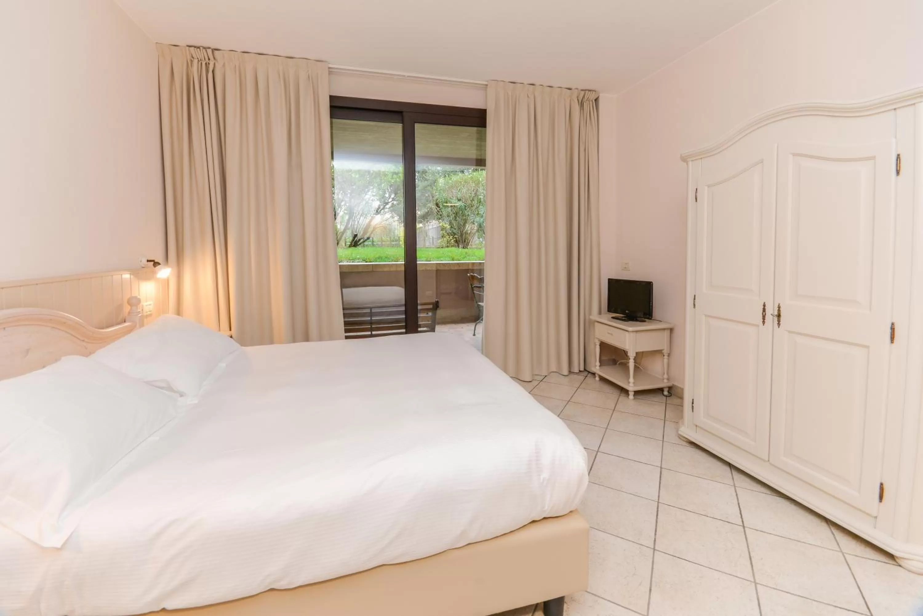 Patio, Bed in Il Sogno Apartments