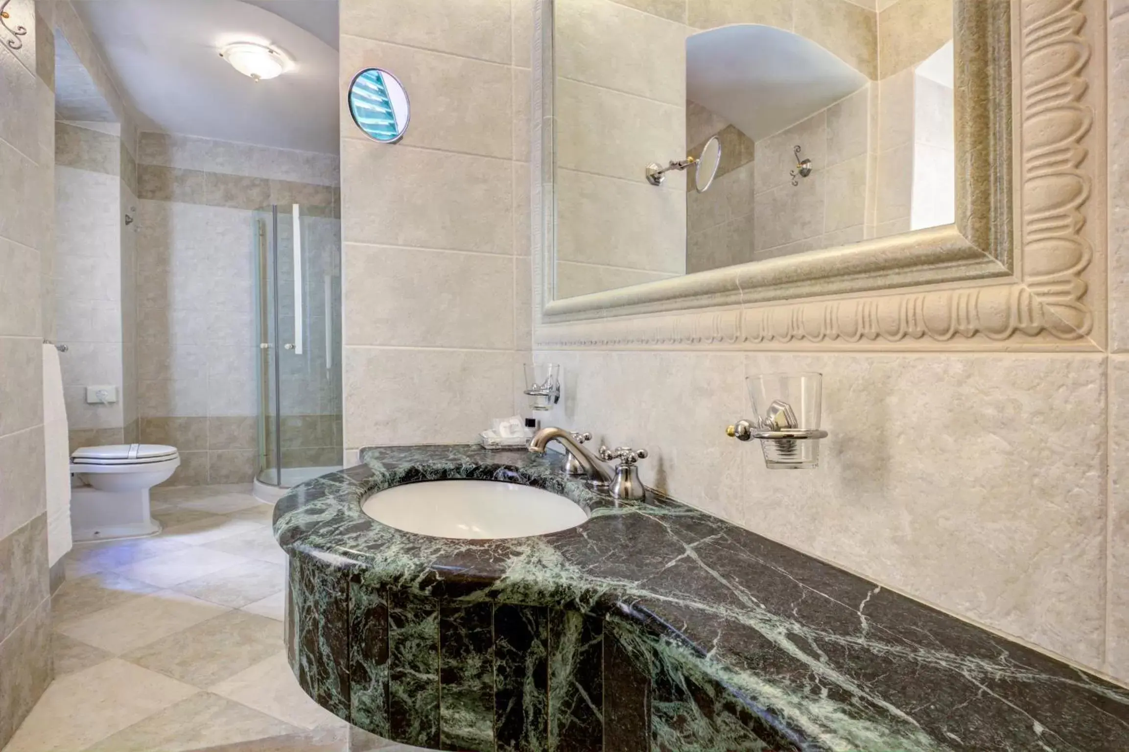 Bathroom in Hotel La Locanda