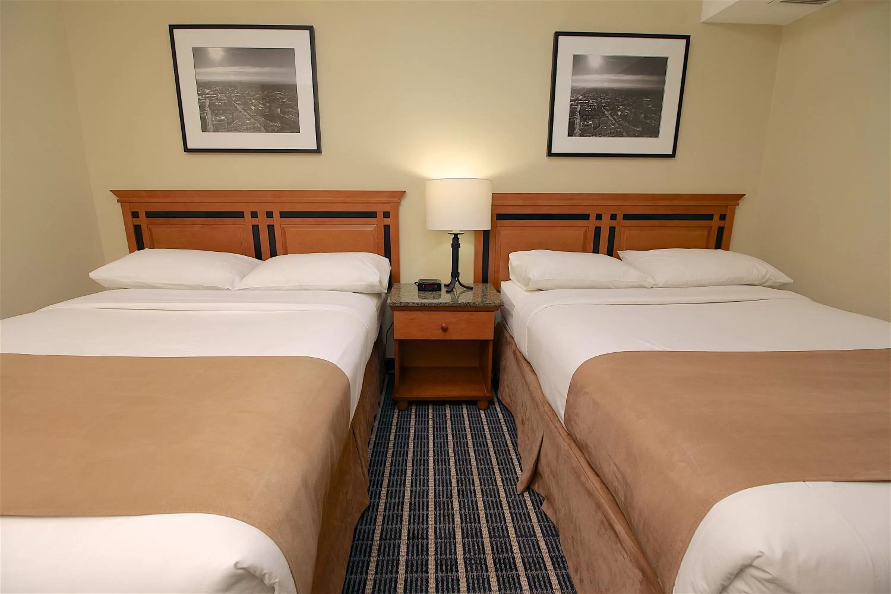 Bed in Medicine Hat Suites