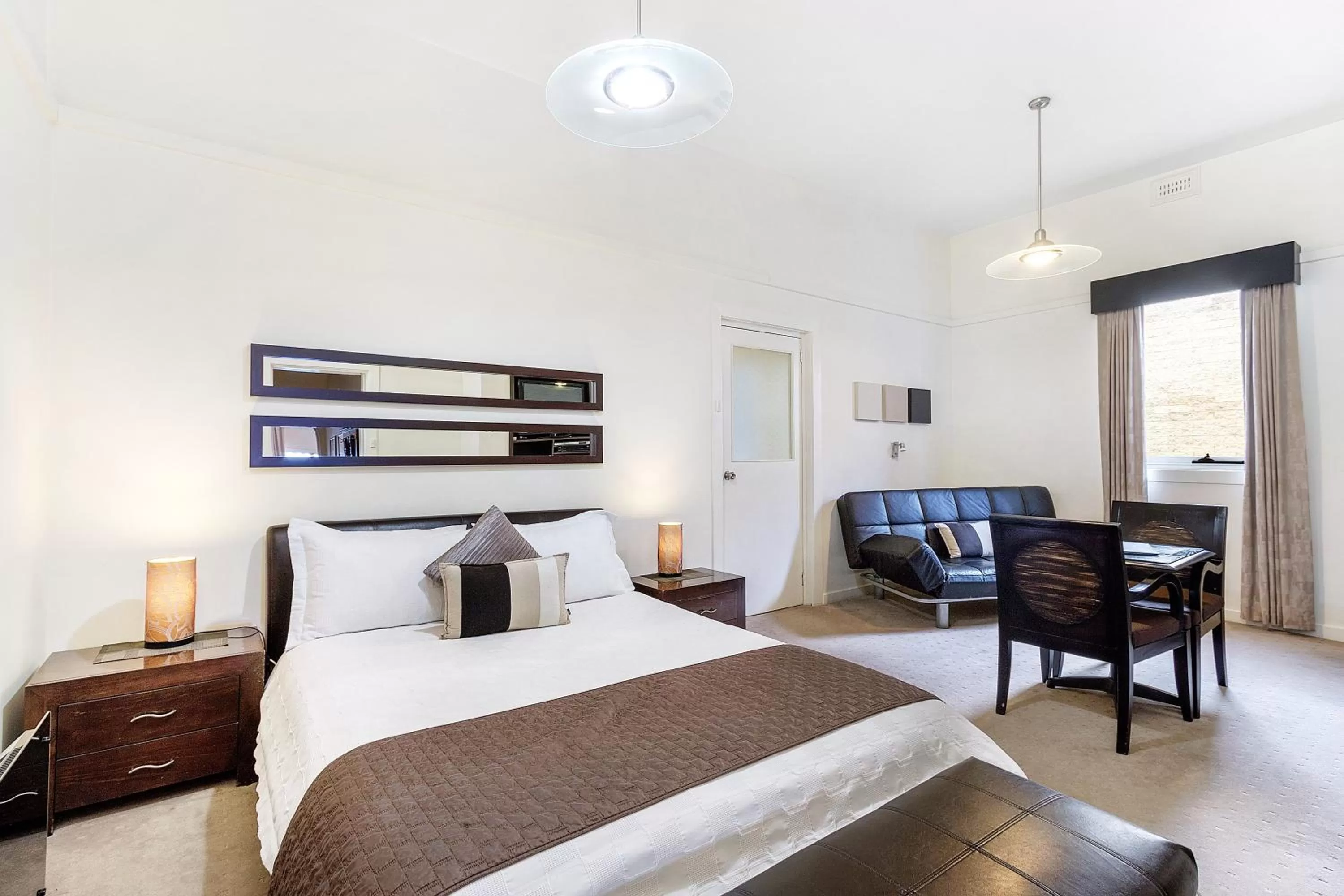 Bed in The Madsen Boutique Hotel