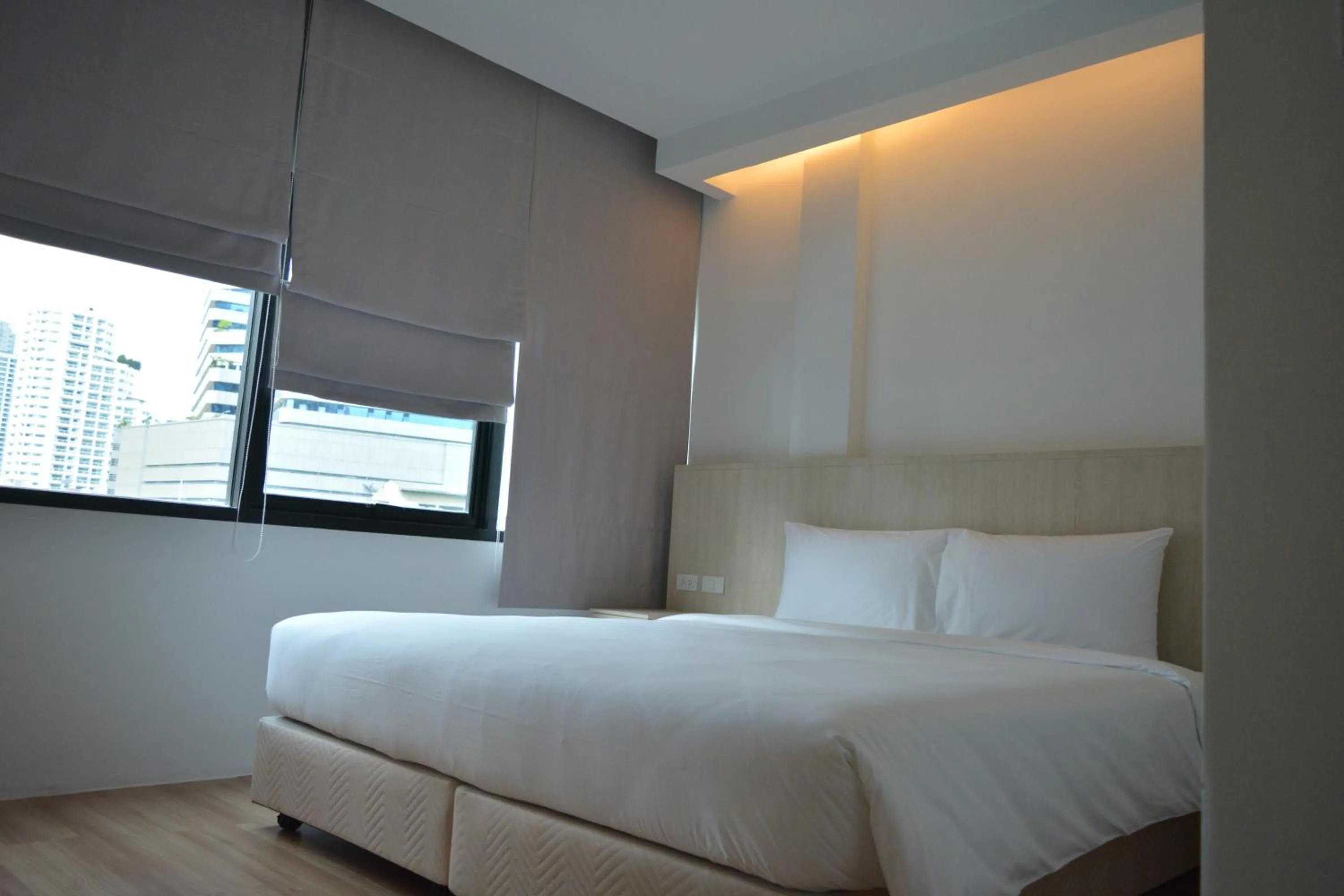 Bed in Rezt Bangkok