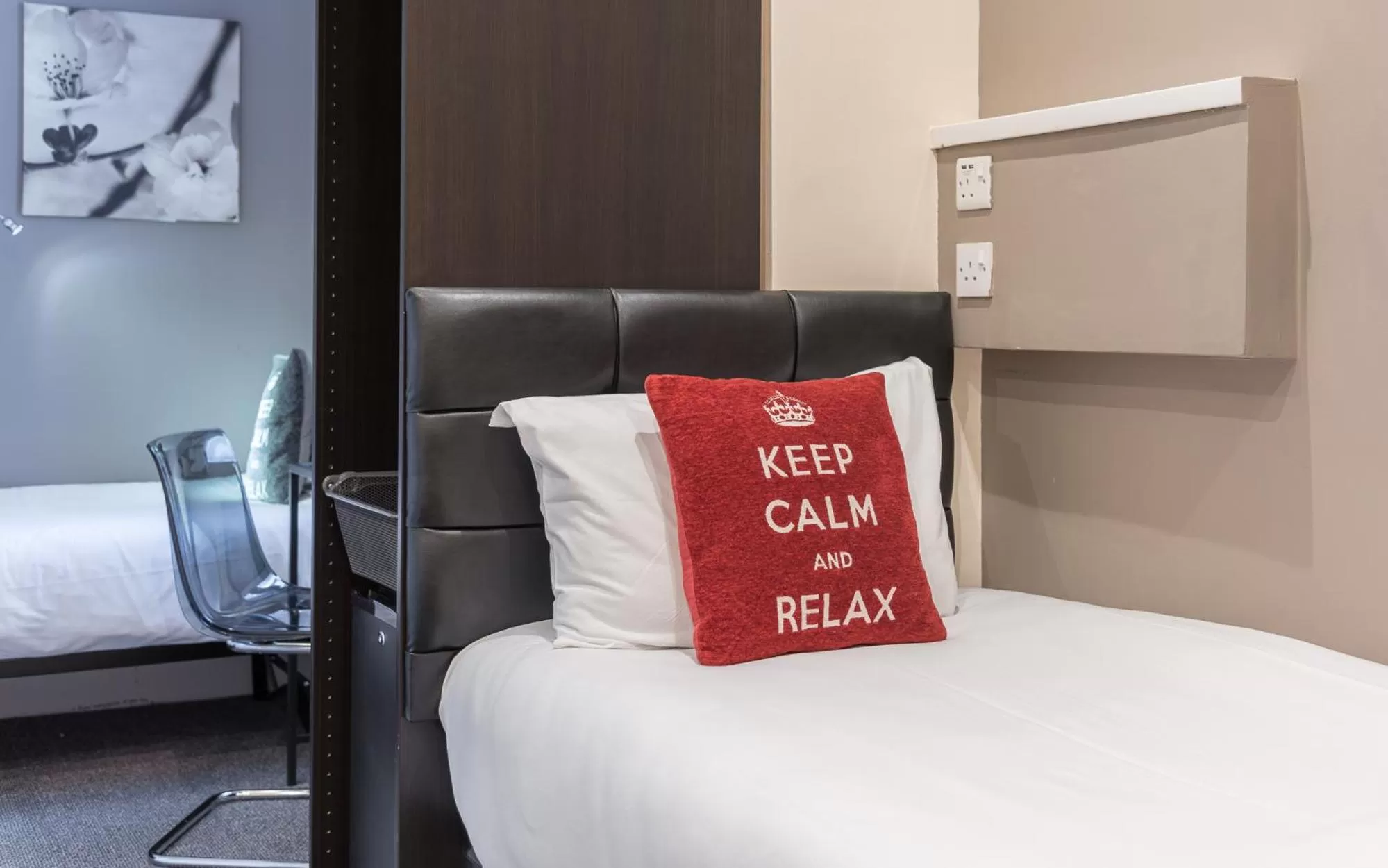 Bed in Hellenic Hotel by Saba