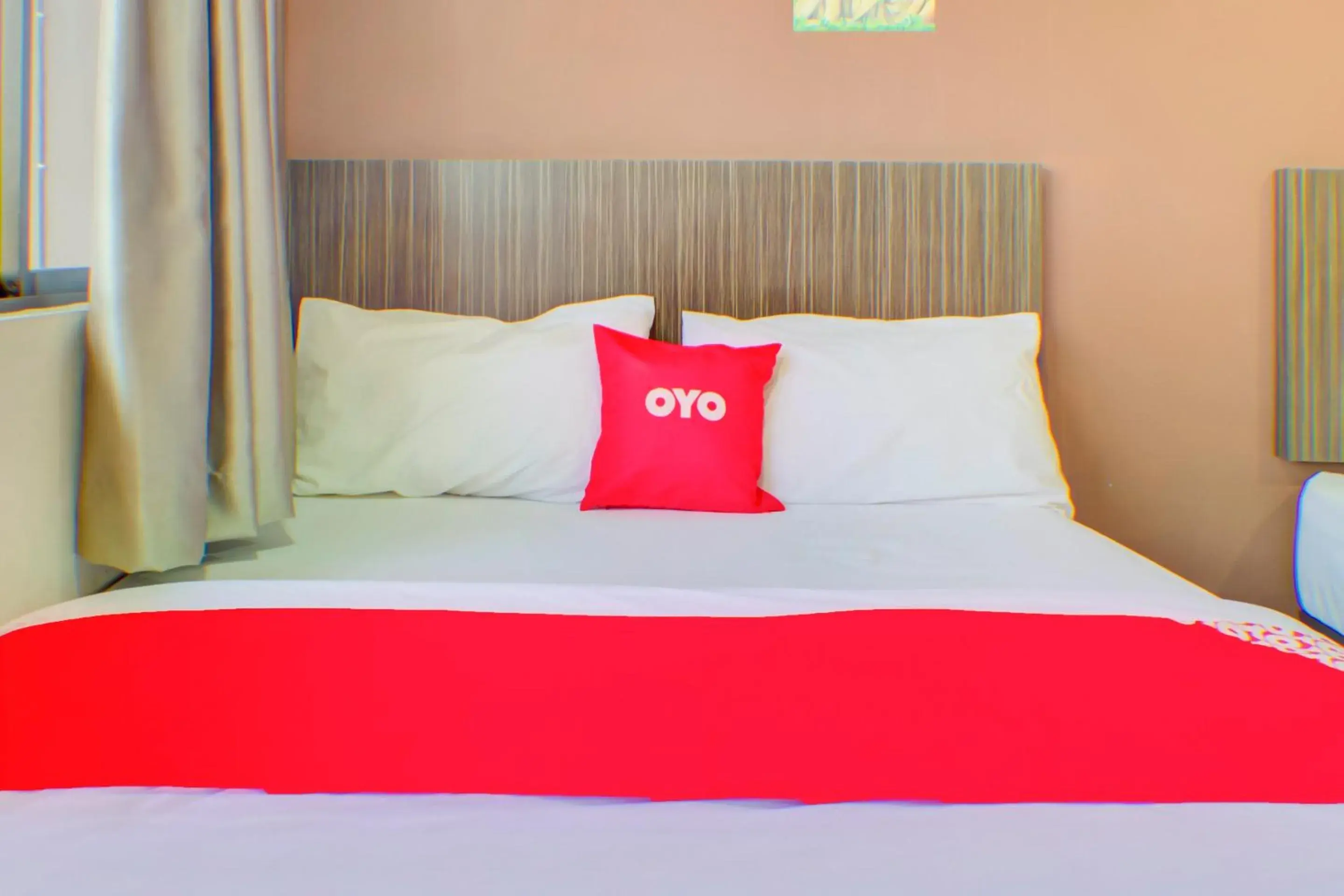 Bed in OYO 89985 Js Hotel