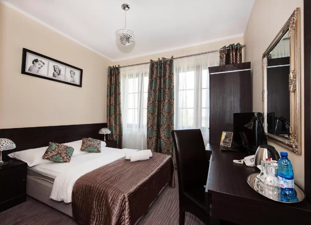 Bed in Hotel Willa Adriana