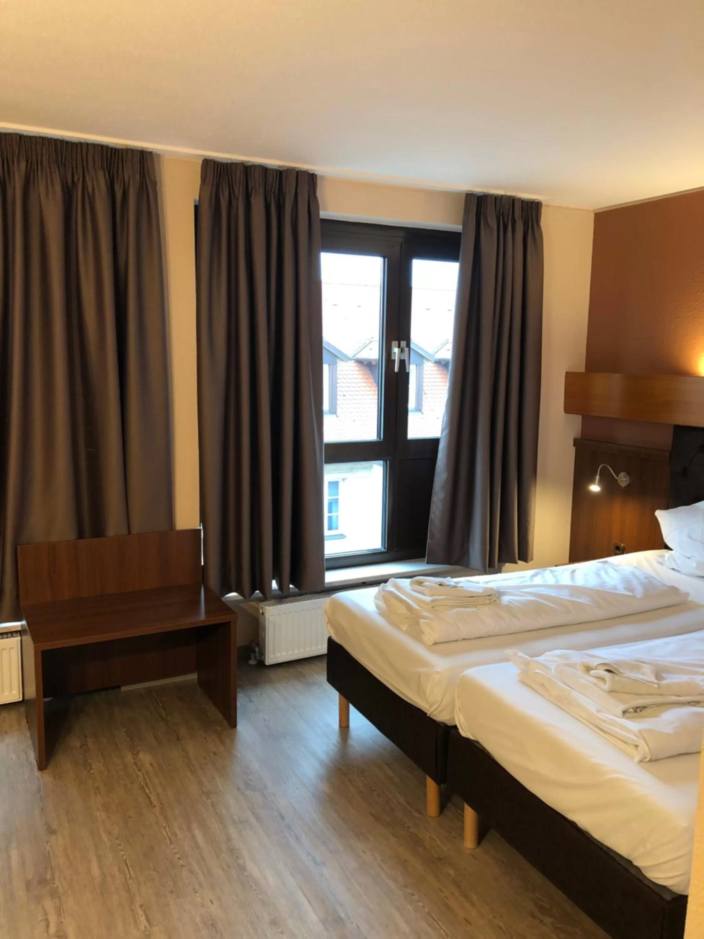 Bed in Hotel Poseidon