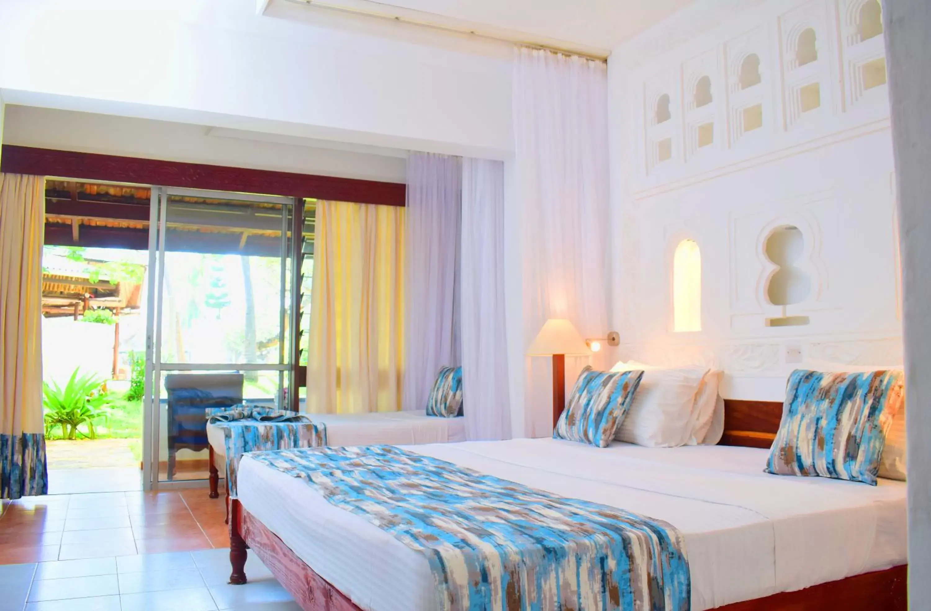 Photo of the whole room, Bed in Reef Hotel Mombasa