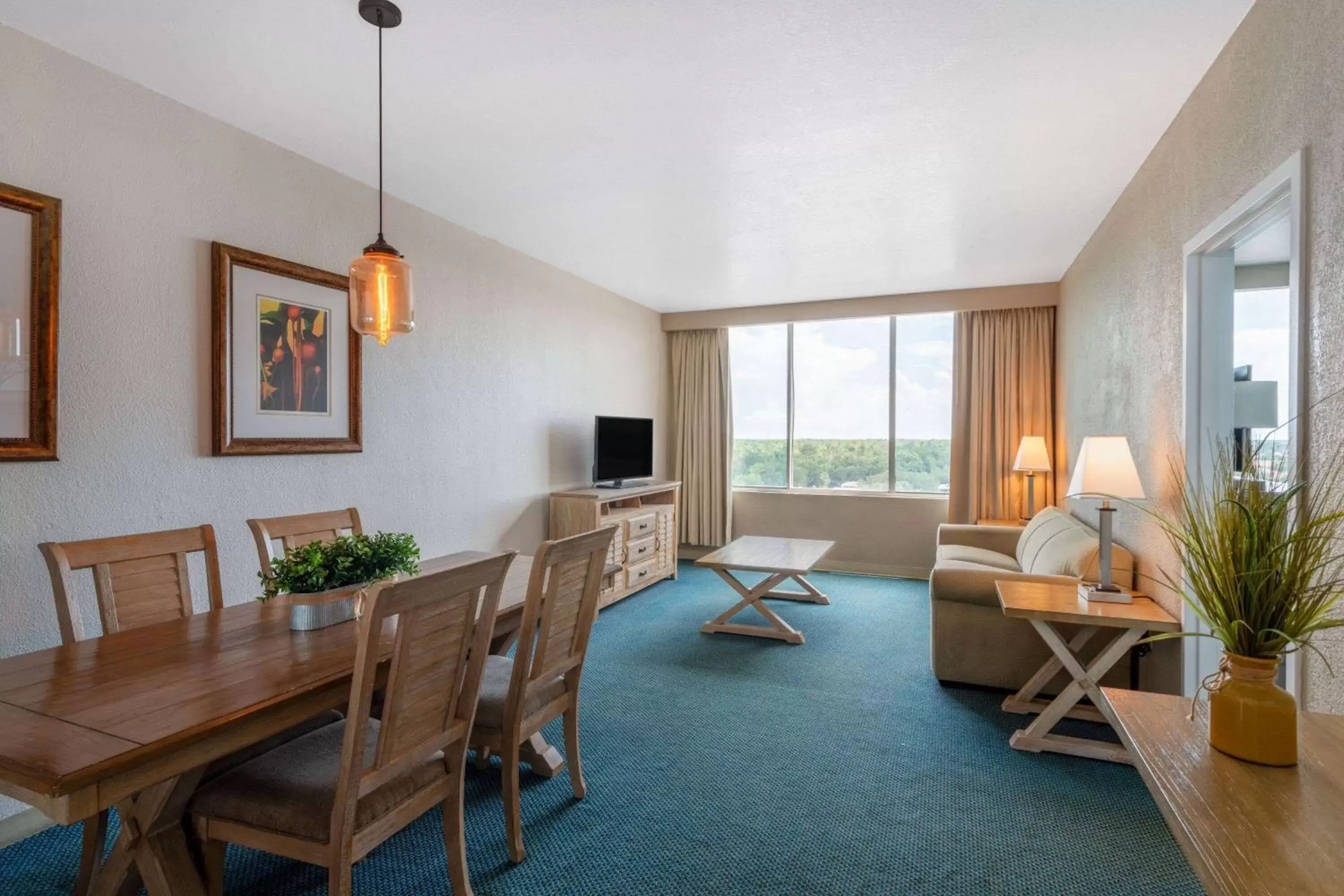 Deluxe King Tower Suite with Sofa Bed in Ramada by Wyndham Kissimmee Gateway