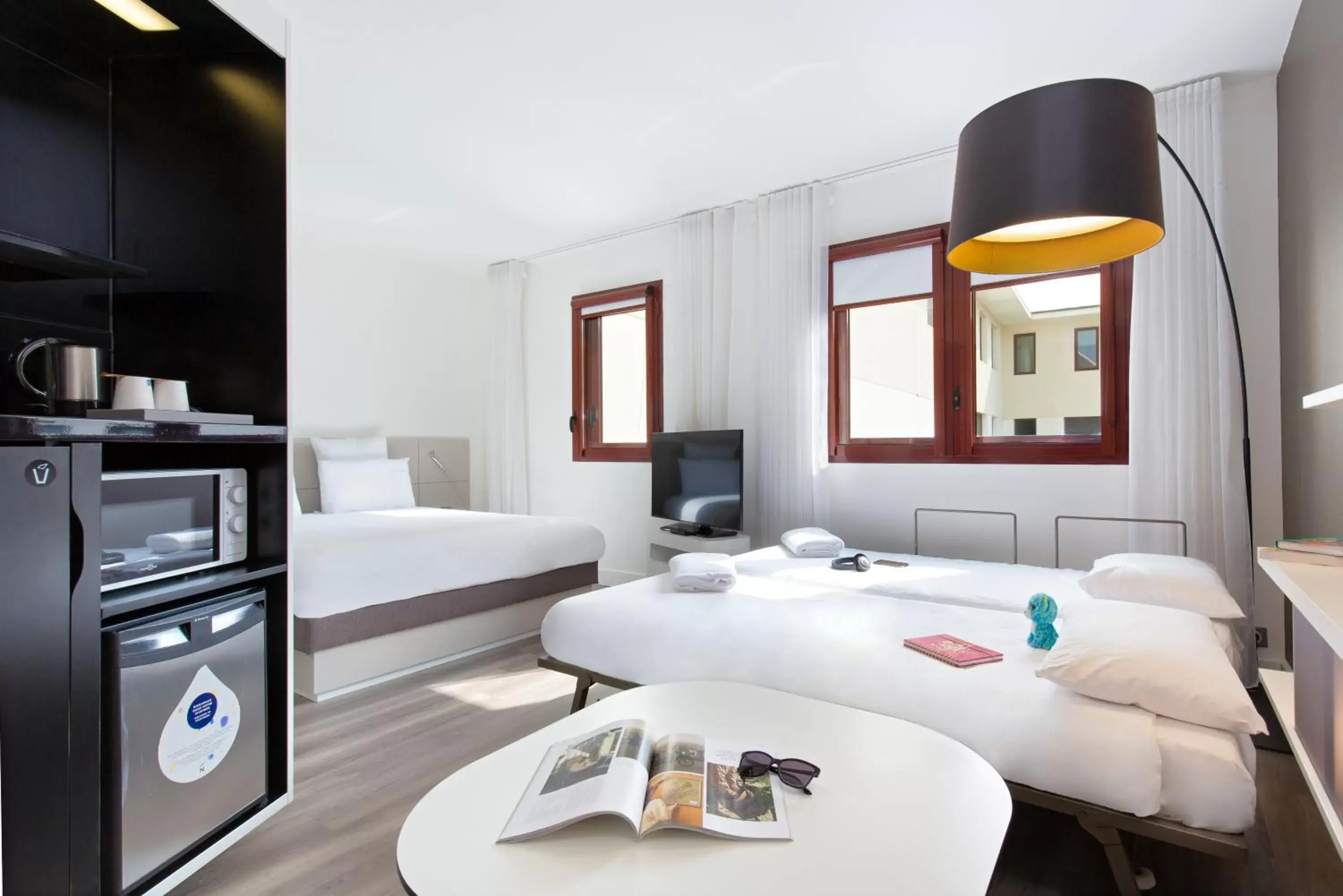 Bed in Novotel Suites Perpignan Centre
