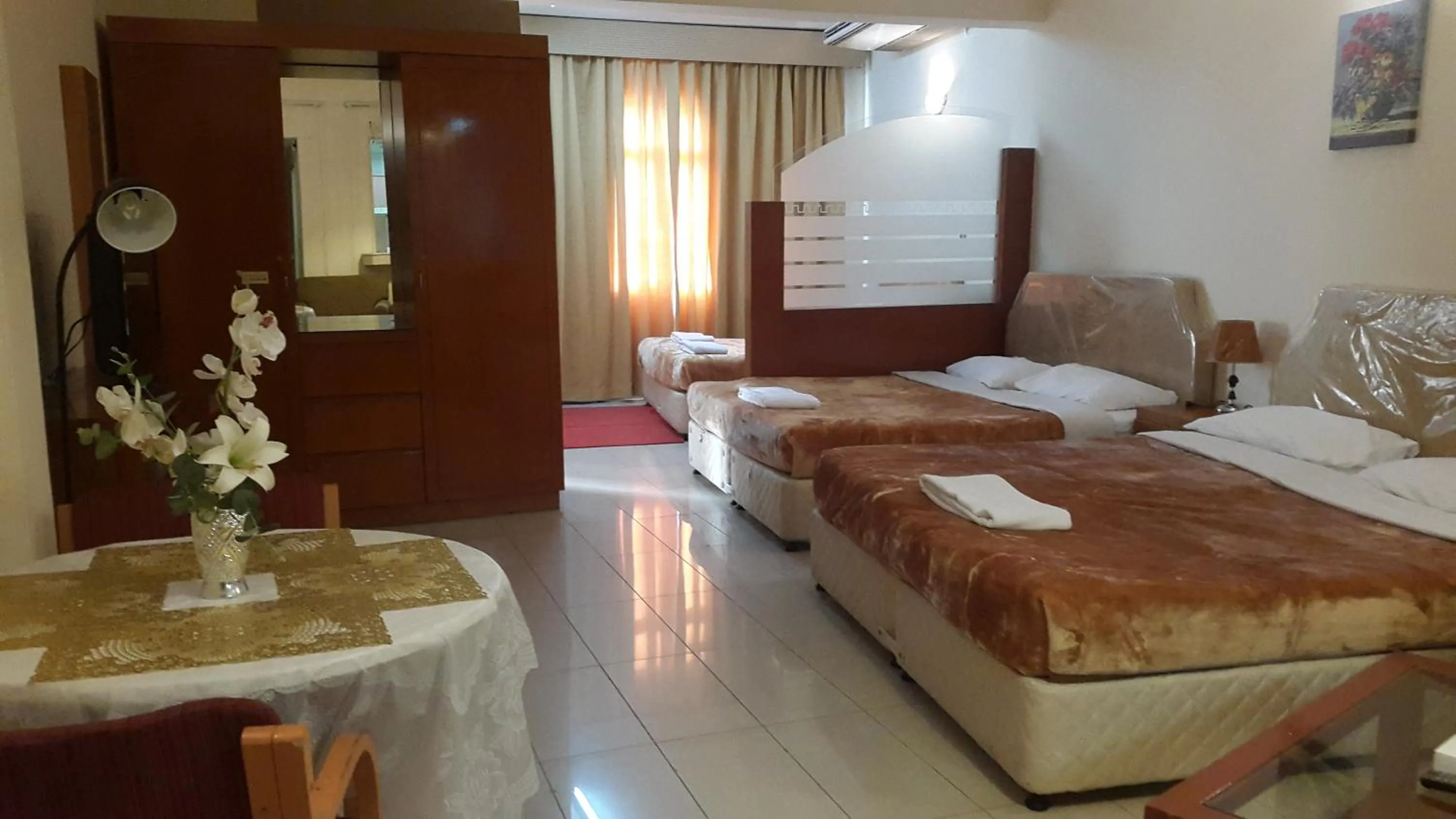 Bed in AL Raien Hotel Apartment