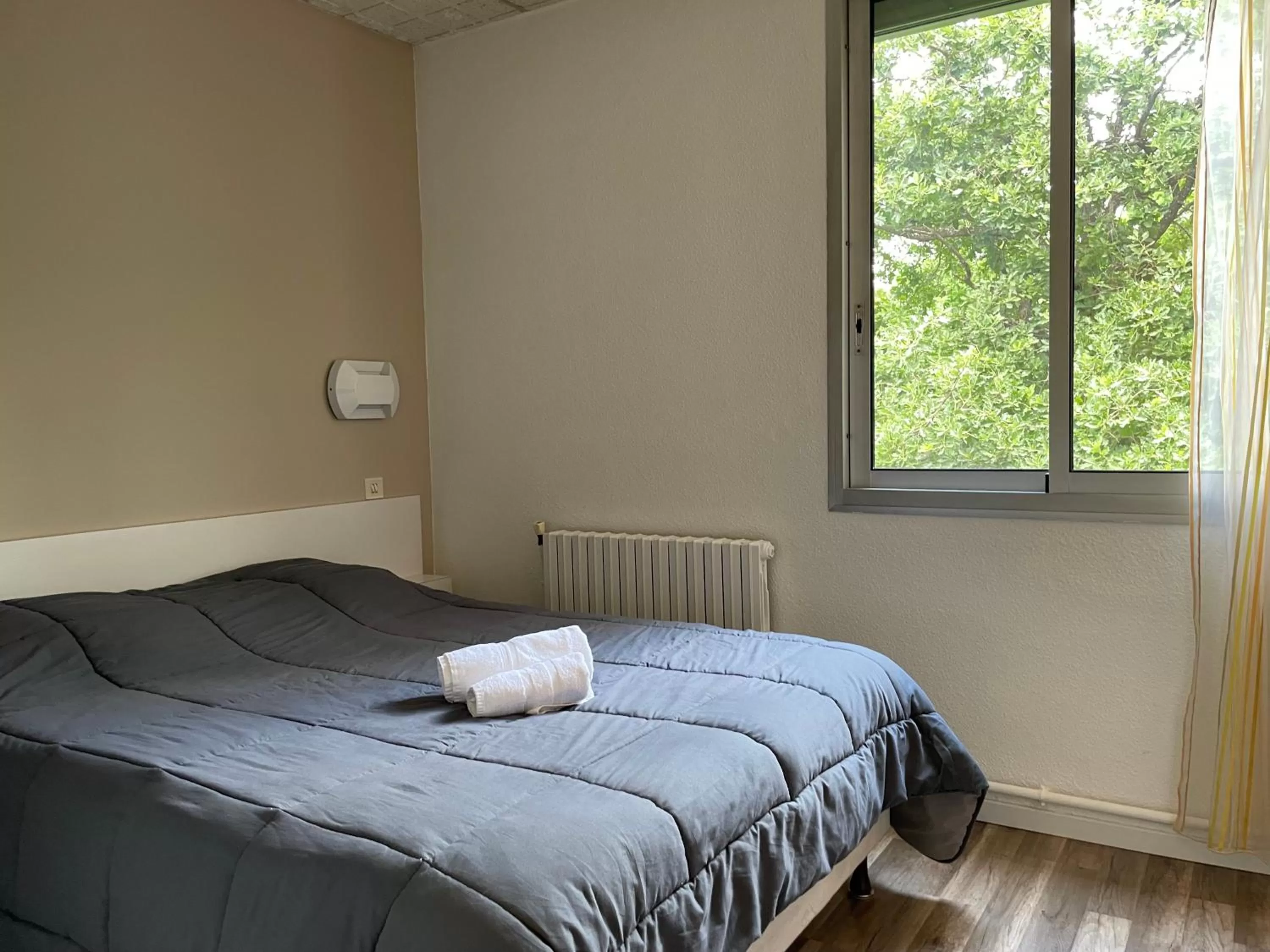 Bed in Hotel Les Chênes